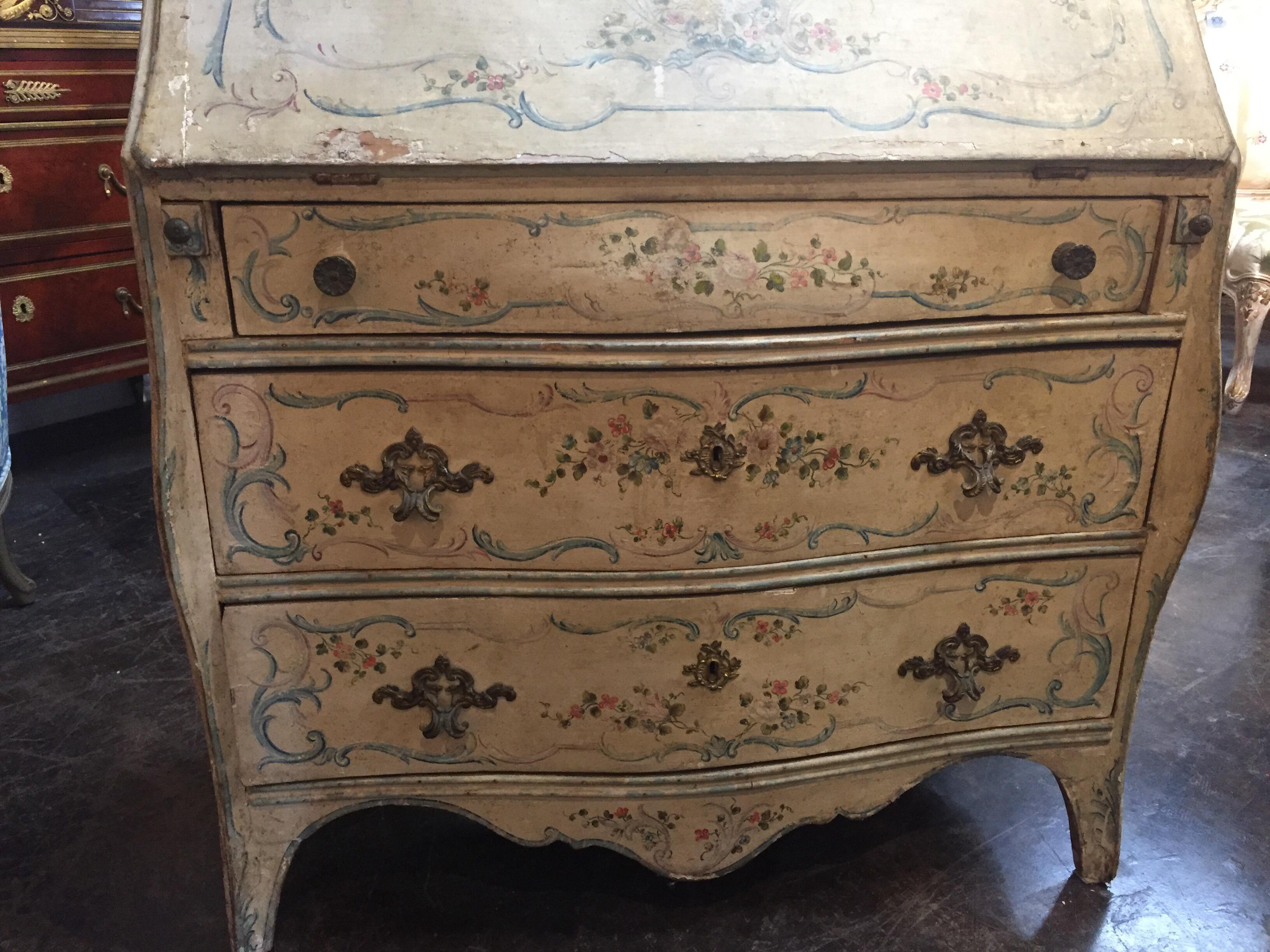 Early 19th century Venetian hand painted secretary with a floral design. Has nice workable area and storage inside the desk. A nice addition to a sitting room or study.