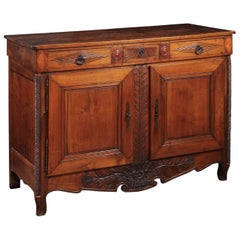 Early 19th Century Walnut Buffet with Carved Apron, France, circa 1800
