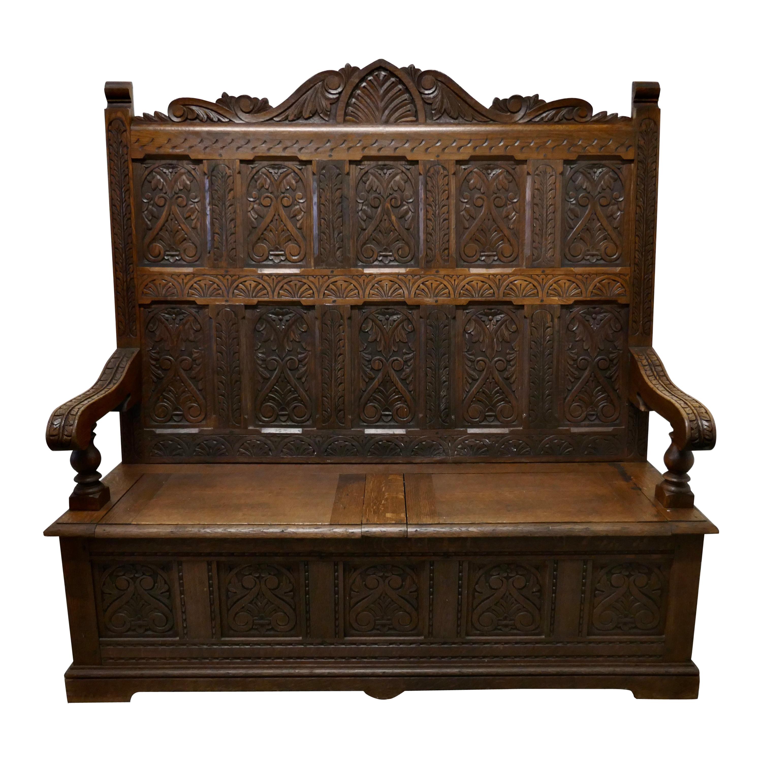 Early 19th Century Welsh High Back Carved Oak Box Settle