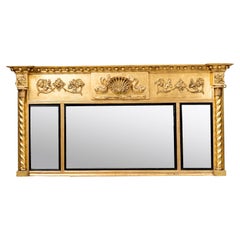 Early 19th Century William IV Giltwood and Ebonised Triptych Overmantle Mirror