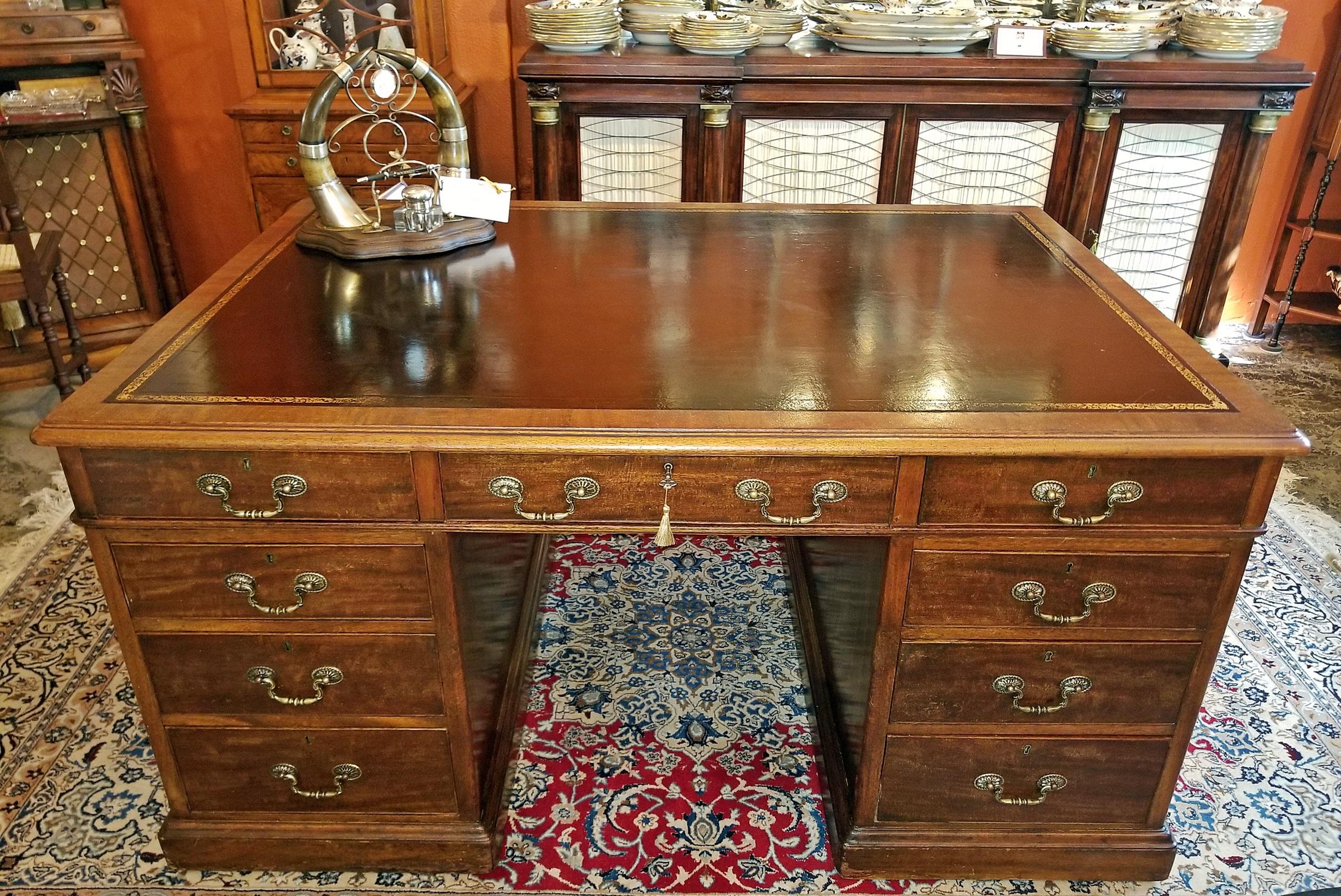 Presenting a beautiful British flame mahogany and tooled leather partners desk, Regency William IV period, circa 1835.
Lovely neat proportions.

Perfect for a home study, library or den!!

Neat and tidy and not fussy or over-complicated, unlike