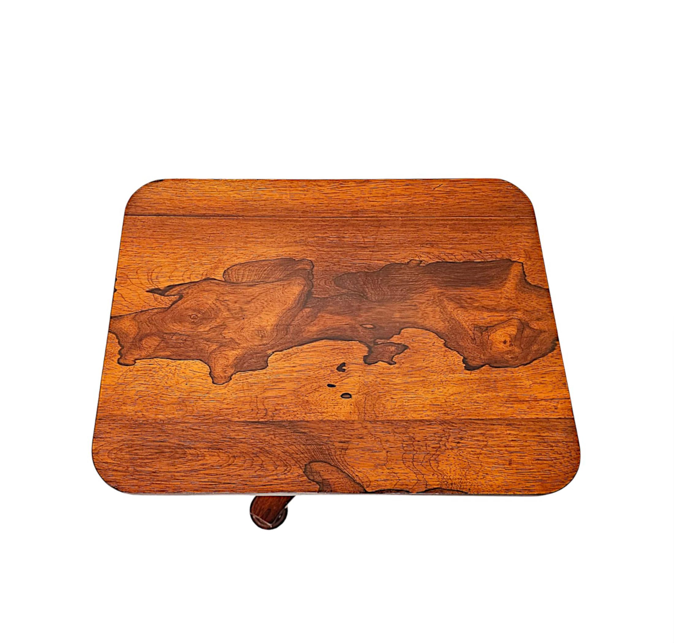 A stunning early 19th Century William IV rosewood pedestal lamp, side or occasional table attributed to Williams and Gibton.  This gorgeous piece is finely hand carved, of exceptional quality and neat proportions with beautifully rich patination and