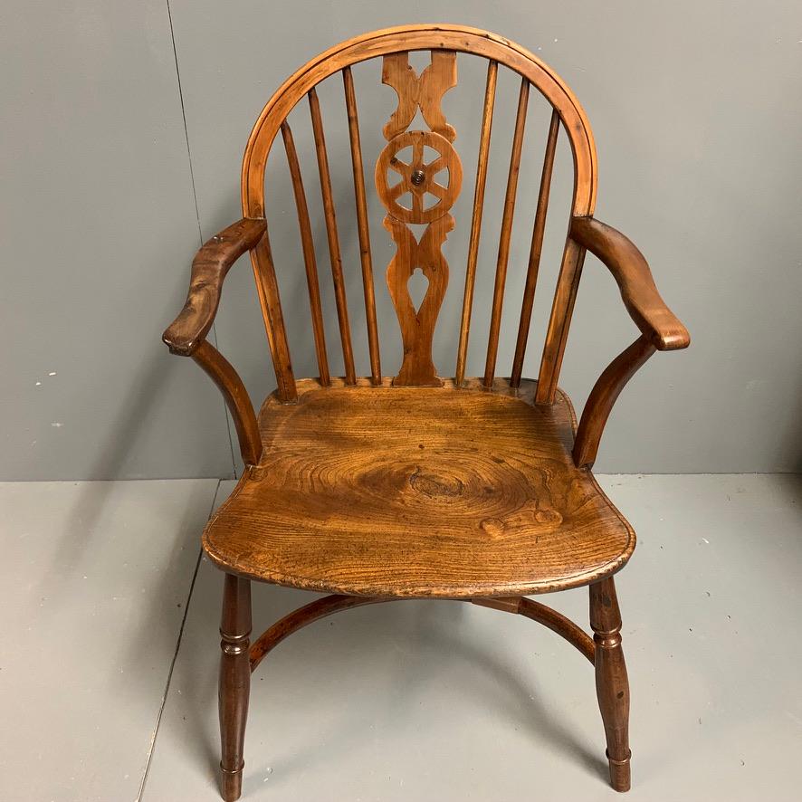 Country Early 19th Century Yew and Elm Windsor Armchair with Crinoline Stretcher