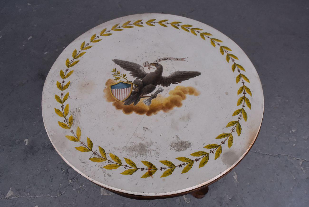 Amazing scagliole pedestal table signed by Philip Della Valle depicting an eagle holding a bunch of arrows, an American flag without stars, surmounted by 24 stars and a motto in its beak: 