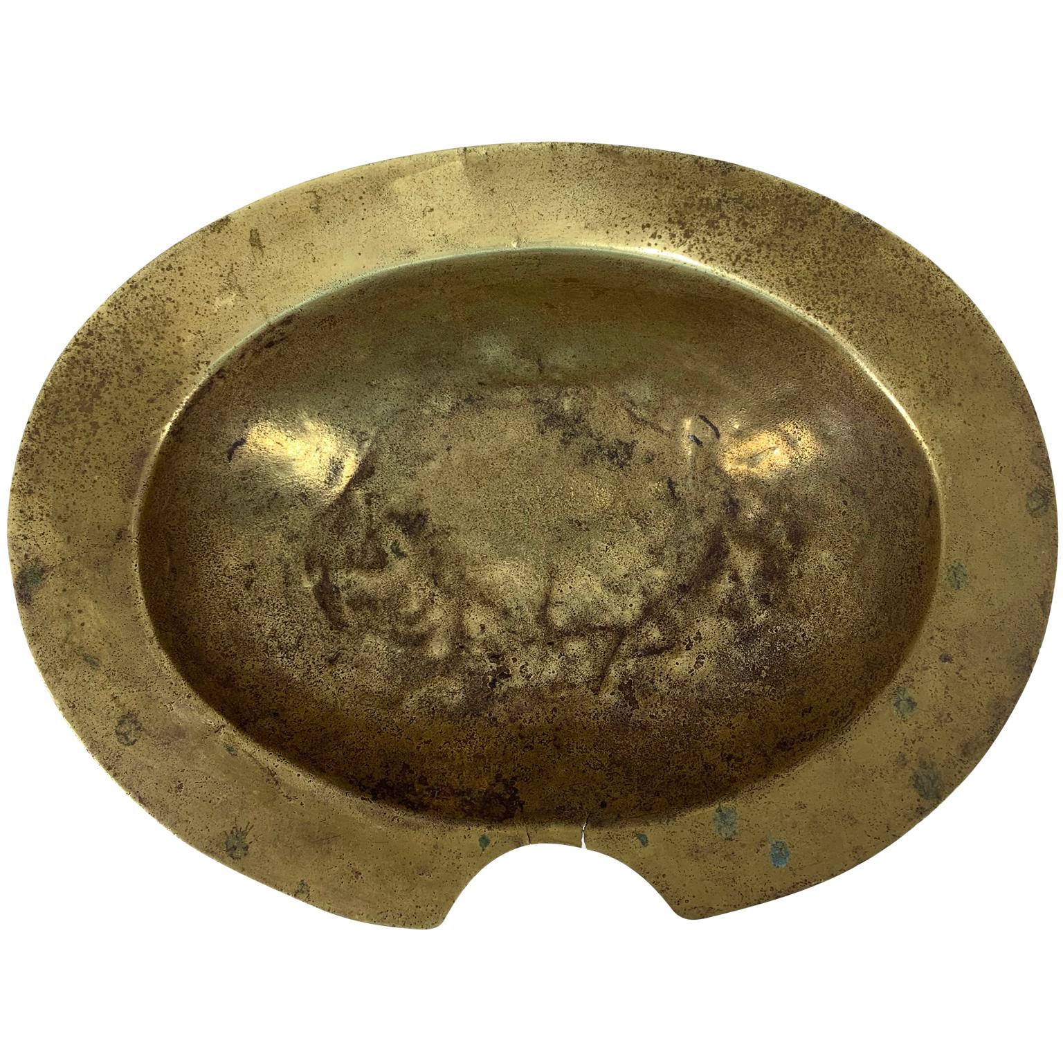 Early 19th European brass bowl.

This bowl was most likely used by a barber or for the macabre purpose of bloodletting.