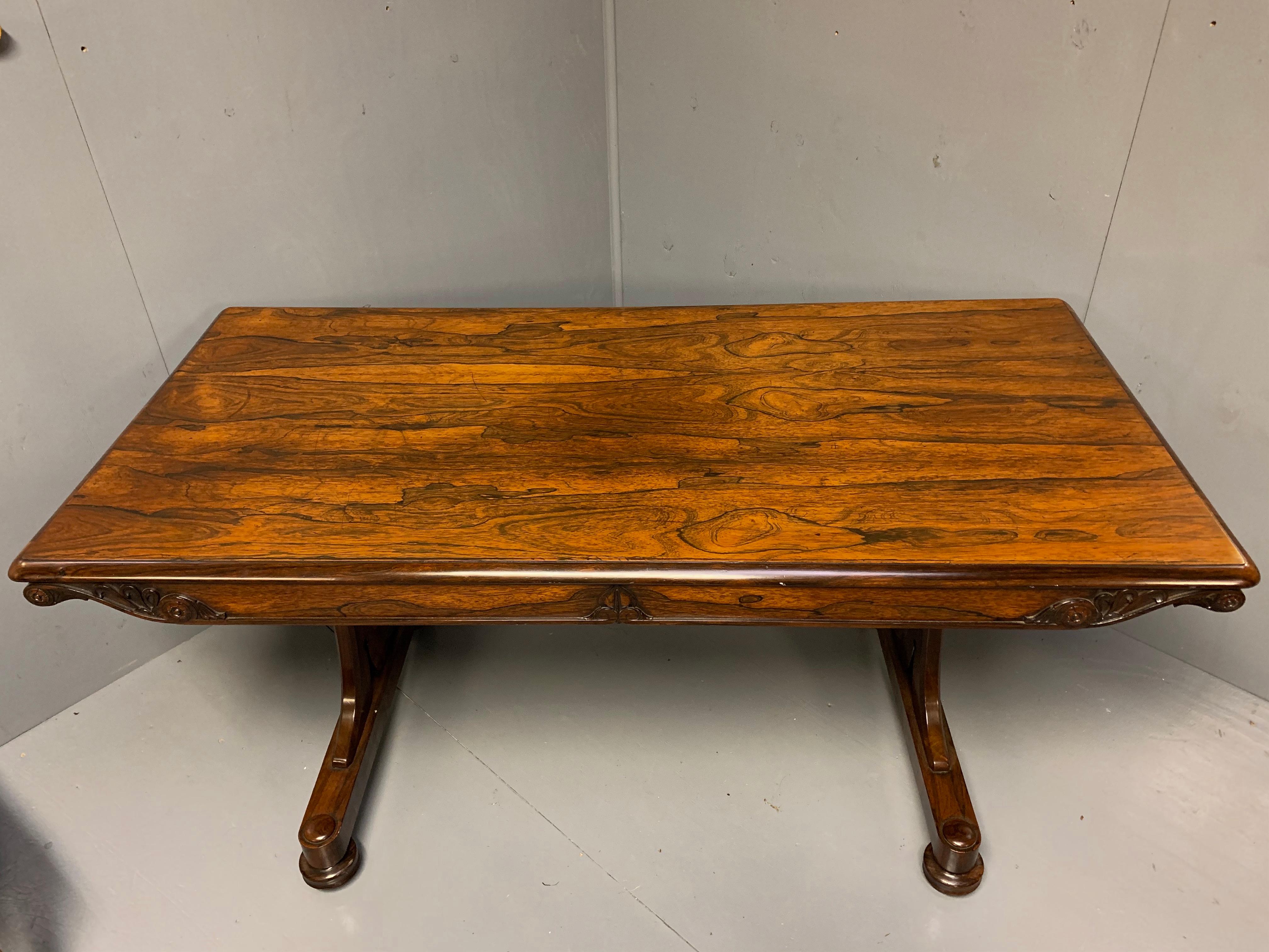 Very fine quality early 19th century Regency rosewood library table, centre or sofa table circa 1820 and in super condition.
Although this is a large piece, it really is very elegant table with its slim top and typical scrolling columns to the