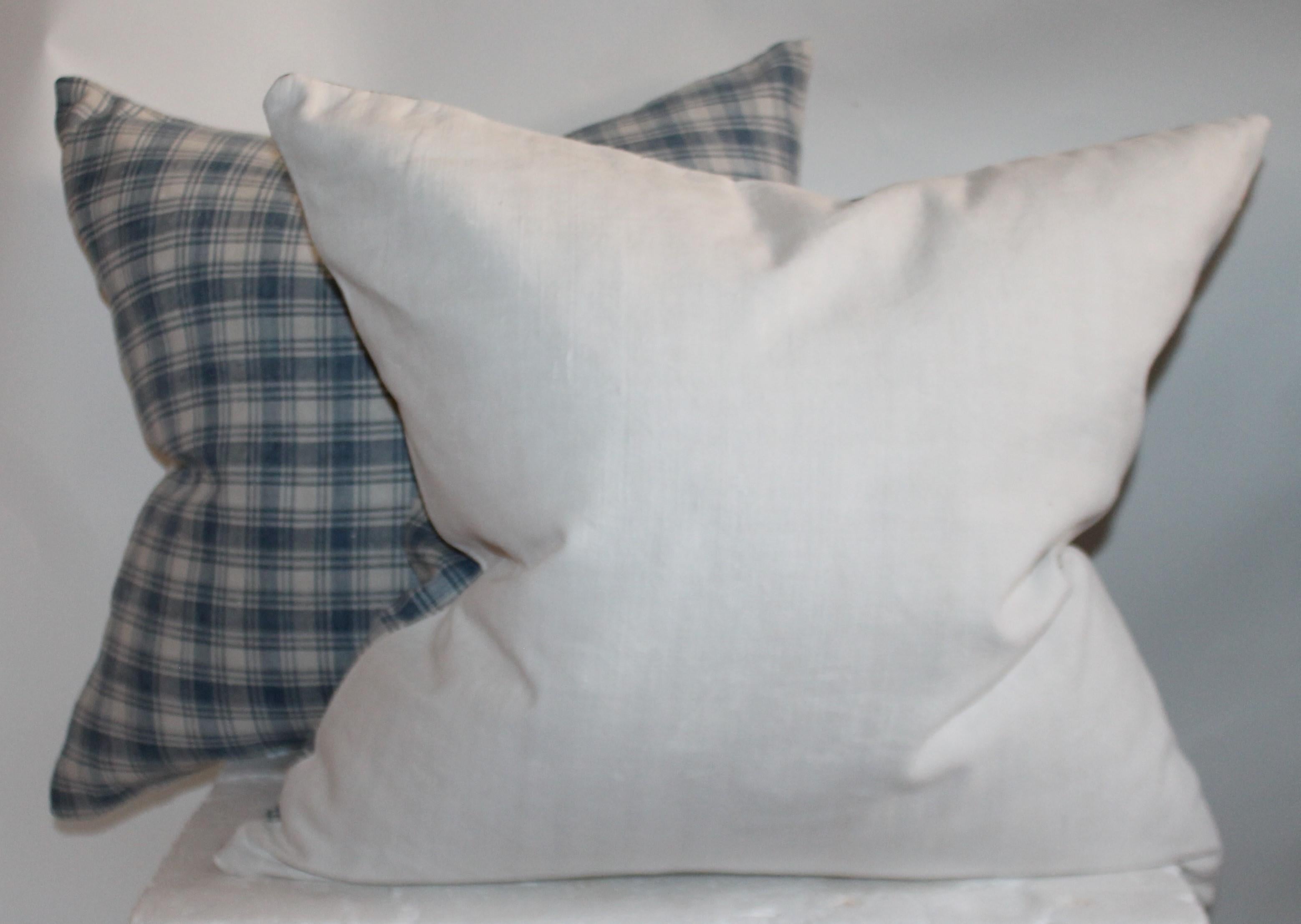 These fine early blue and white homespun cotton linen pillows are in fine condition. Sold as a pair.