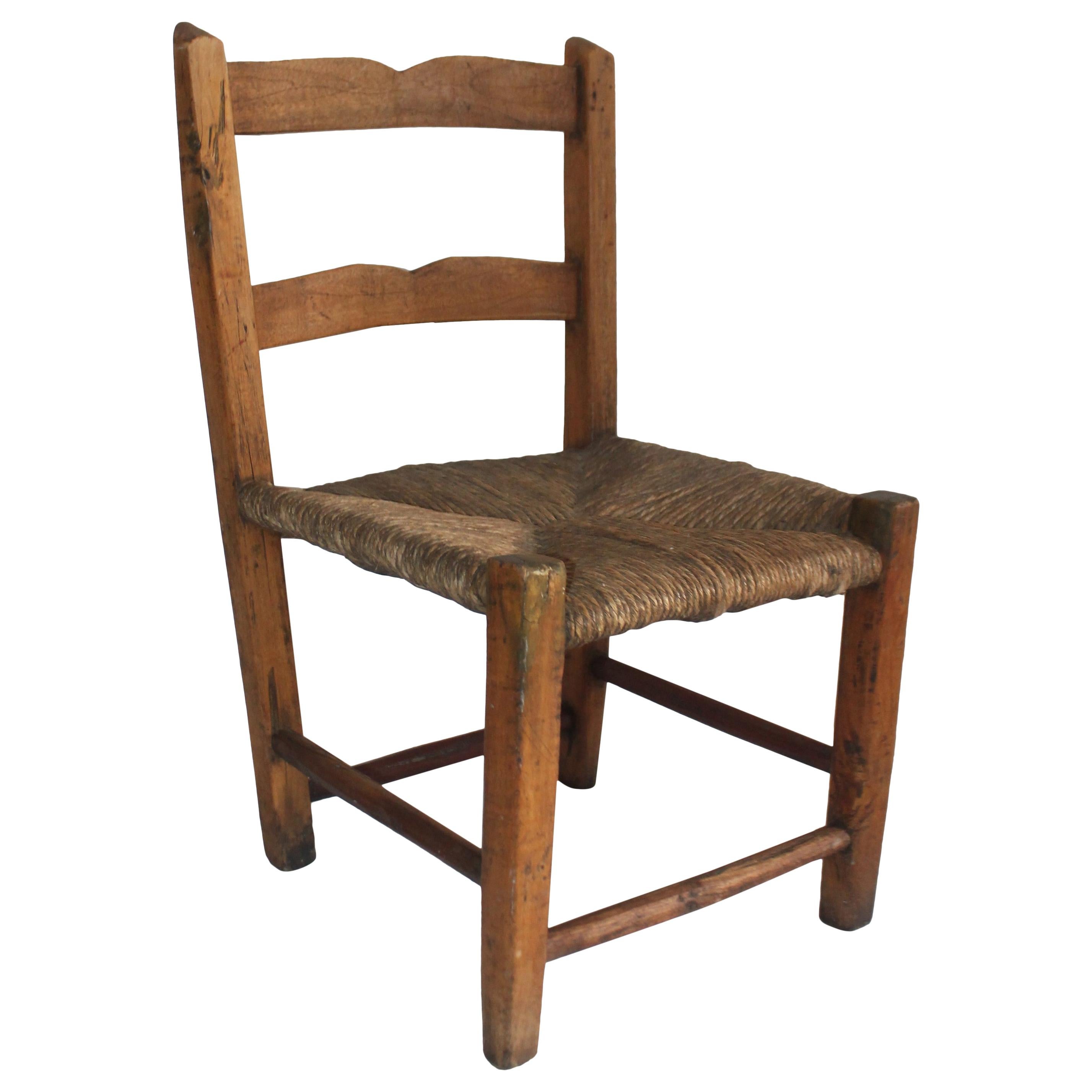 Early 19th Century Child's Chair with Original Rush Seat For Sale