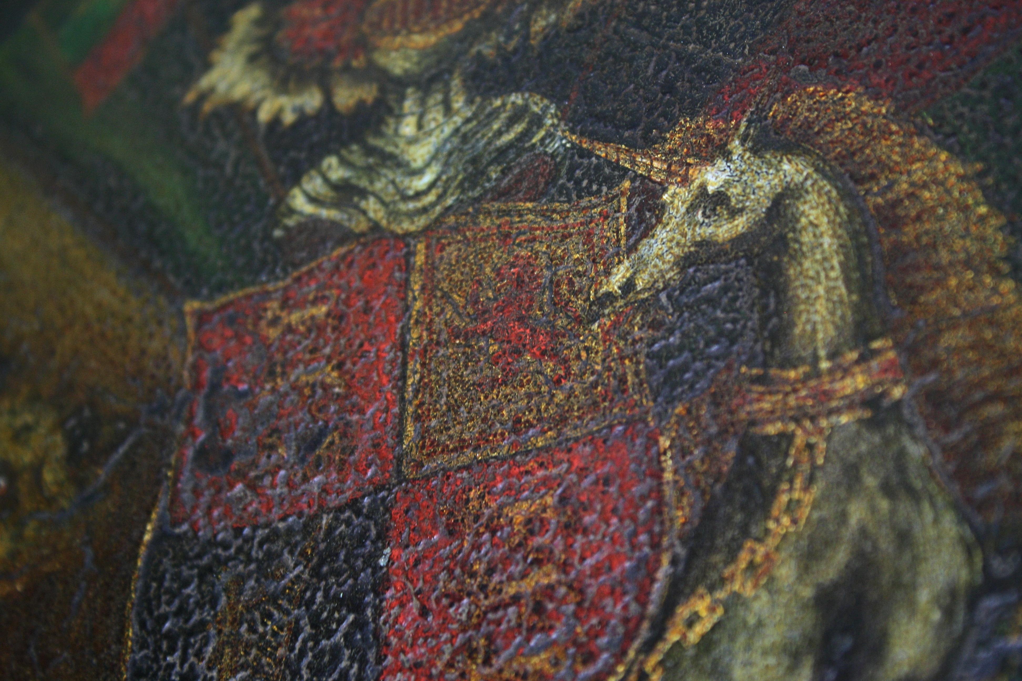 A early 19th century coach panel bearing the British Royal coat of arms, the quartered central shield surrounded by the Order of the Garter, beneath a crowned helm with flowing mantel, above the lion and unicorn rampant supporters, bearing below on