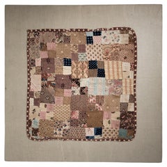 Quilt de poupée monté en patchwork du début du 19e siècle