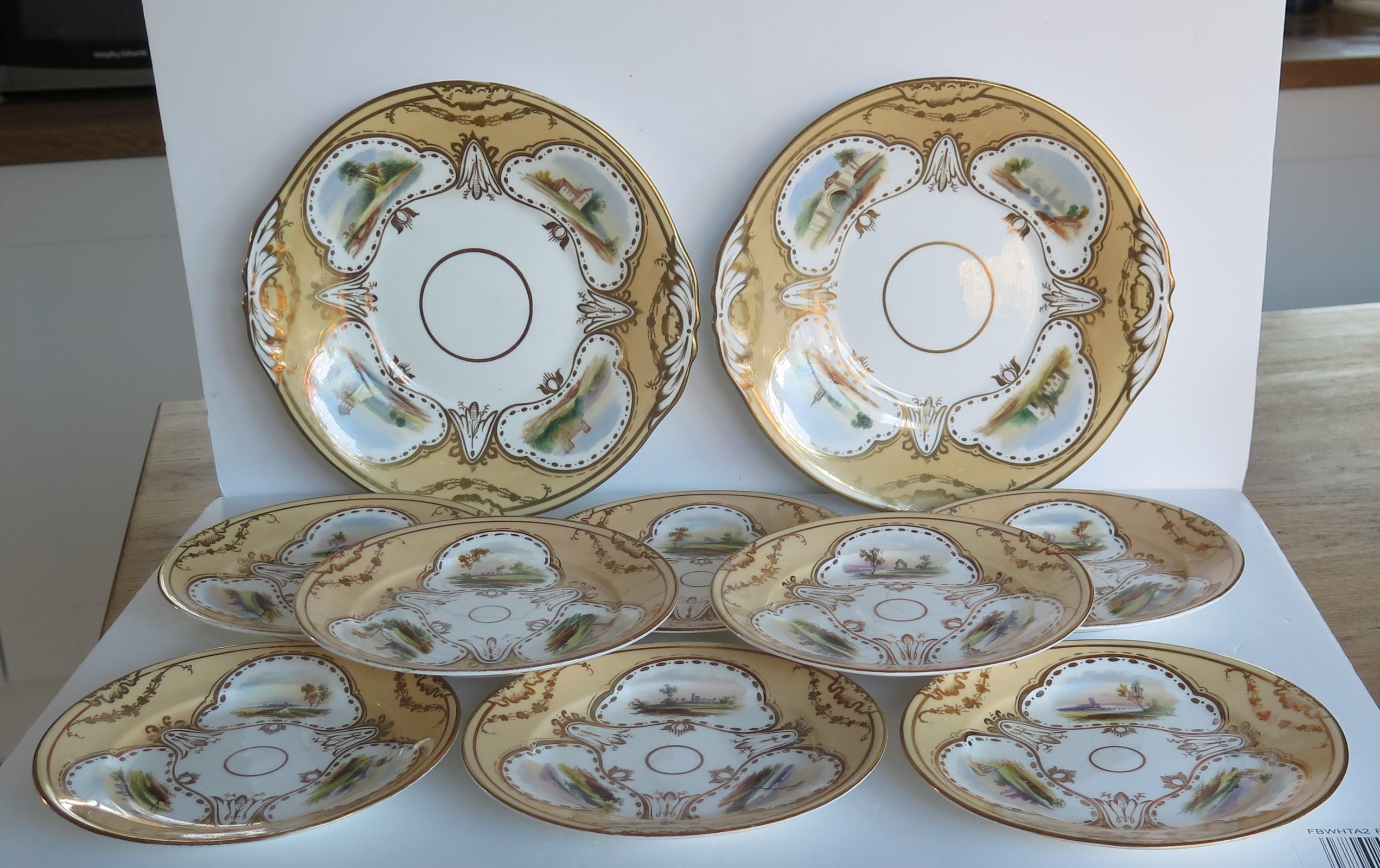 This is an early 19th century high quality porcelain Serving Set of two large serving plates plus 8 matching side plates, all hand painted with different scenes, which we attribute to Rockingham or another quality Staffordshire, English pottery and