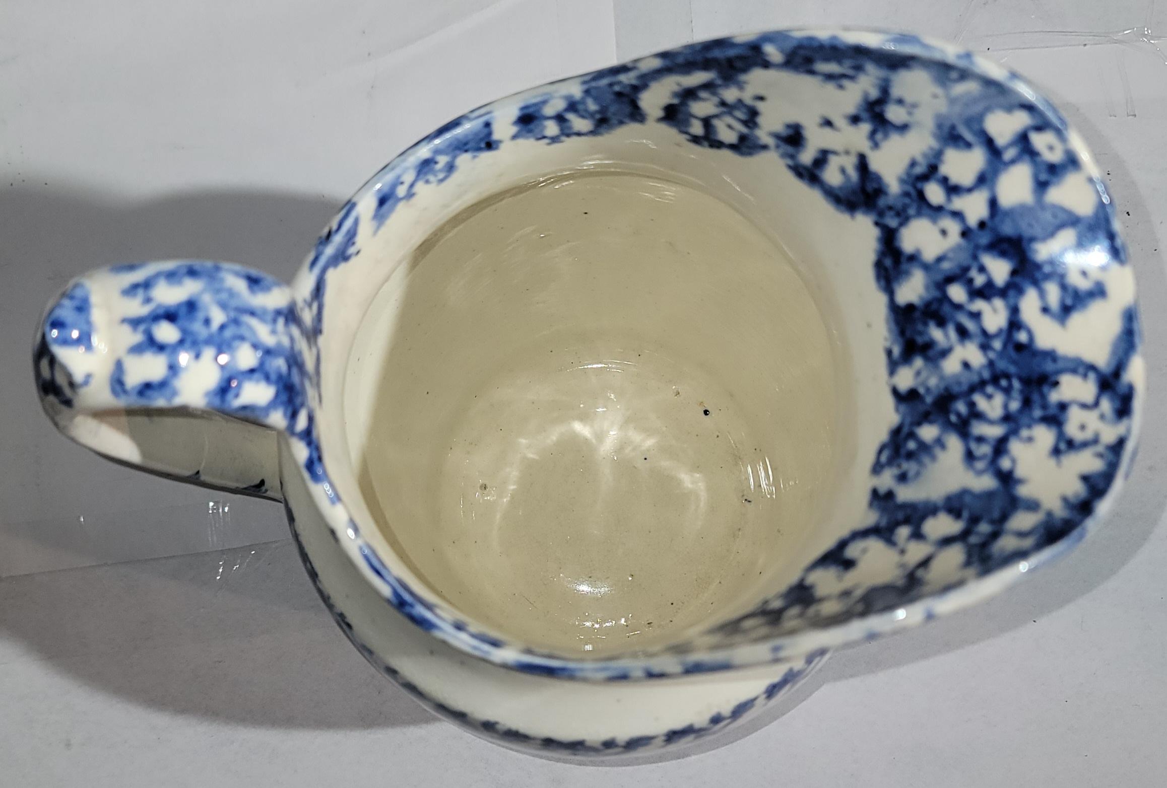 This fine 19thc soft paste (similar to a lighter ironstone pottery ) in pristine condition. This fine sponge patterned water pitcher is in fine condition.