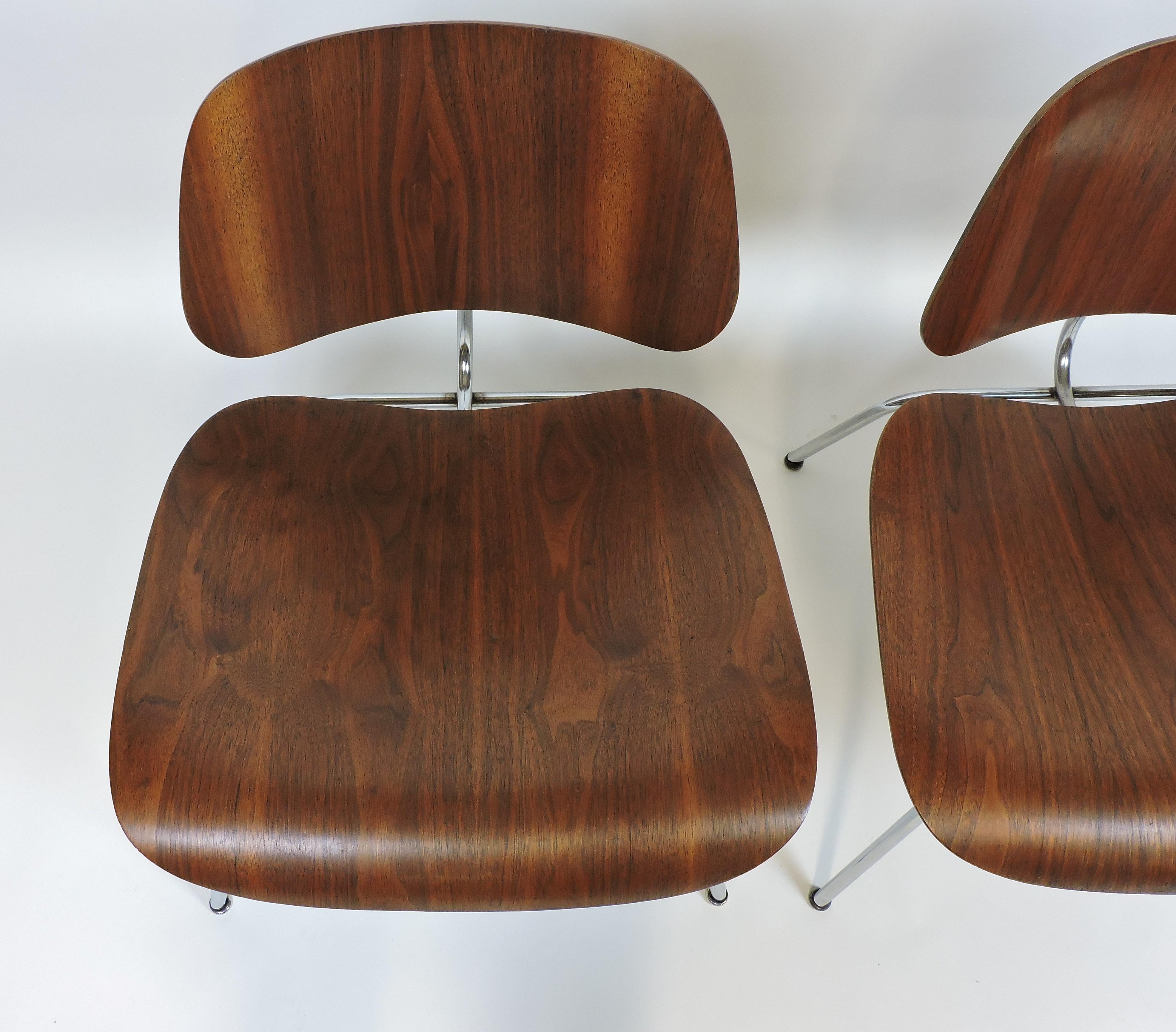 Hard to find pair of early LCM chairs designed by Charles and Ray Eames and manufactured in the 1940s by Evans Products Company. These chairs are in very good condition with minor wear, possible repairs to some shock mounts and good, original