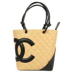 Early 2000s Chanel Beige And Black Leather Cambon Small Tote Bag