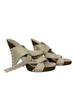 Early 2000s Chanel Ivory Leather Studded Wrap Sandals on Wooden Platform
