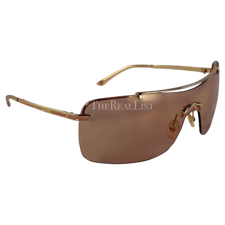 Early 2000s Christian Dior by John Galliano Pink Gold Rimless Shield  Sunglasses For Sale at 1stDibs | john galliano glasses, john galliano  sunglasses