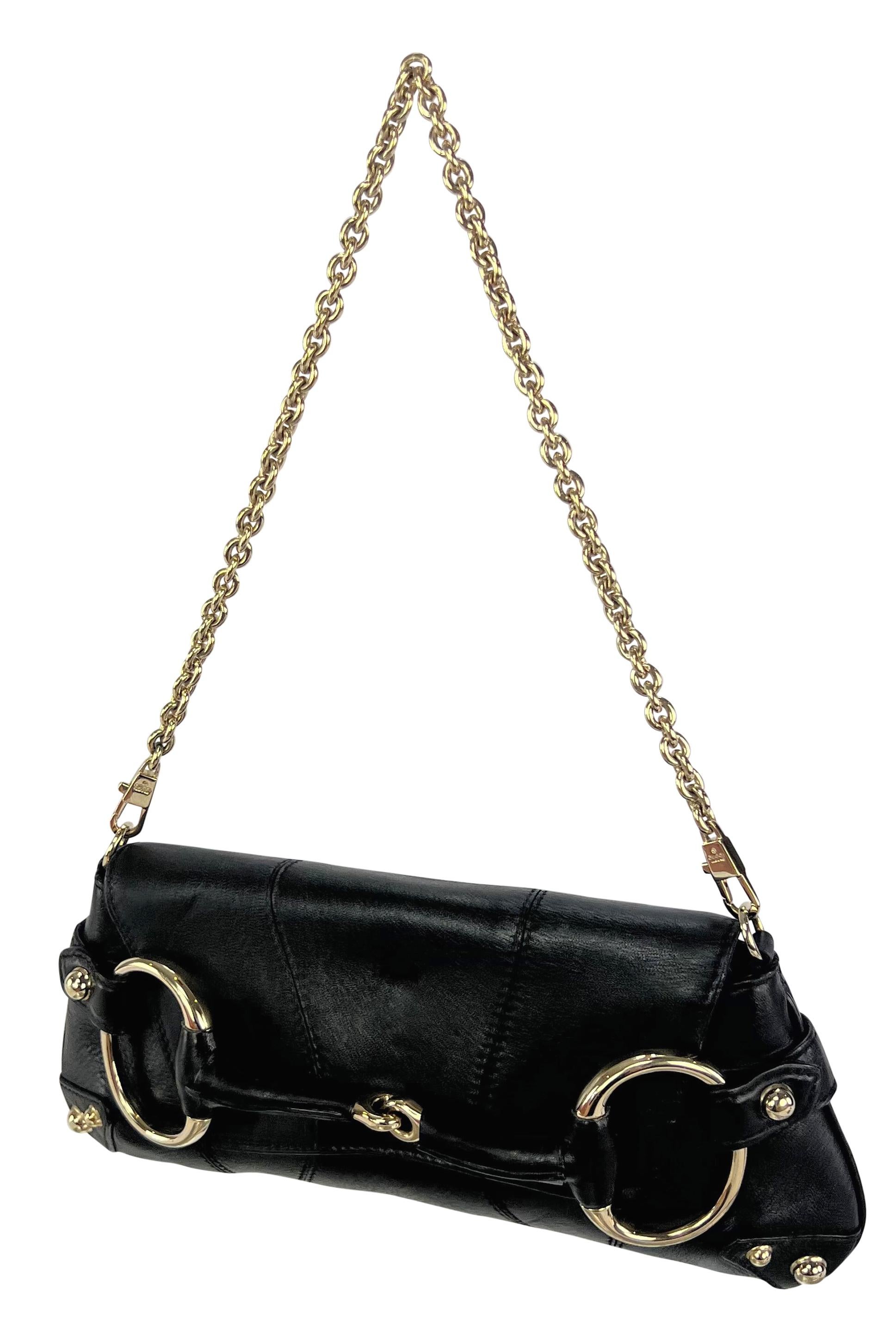 Designed by Tom Ford in the early 2000s, this chic black leather Gucci convertible bag showcases a horse-bit style. Crafted entirely from leather, the bag features silver-tone hardware, a prominent leather-accented horse bit at the front, and silver