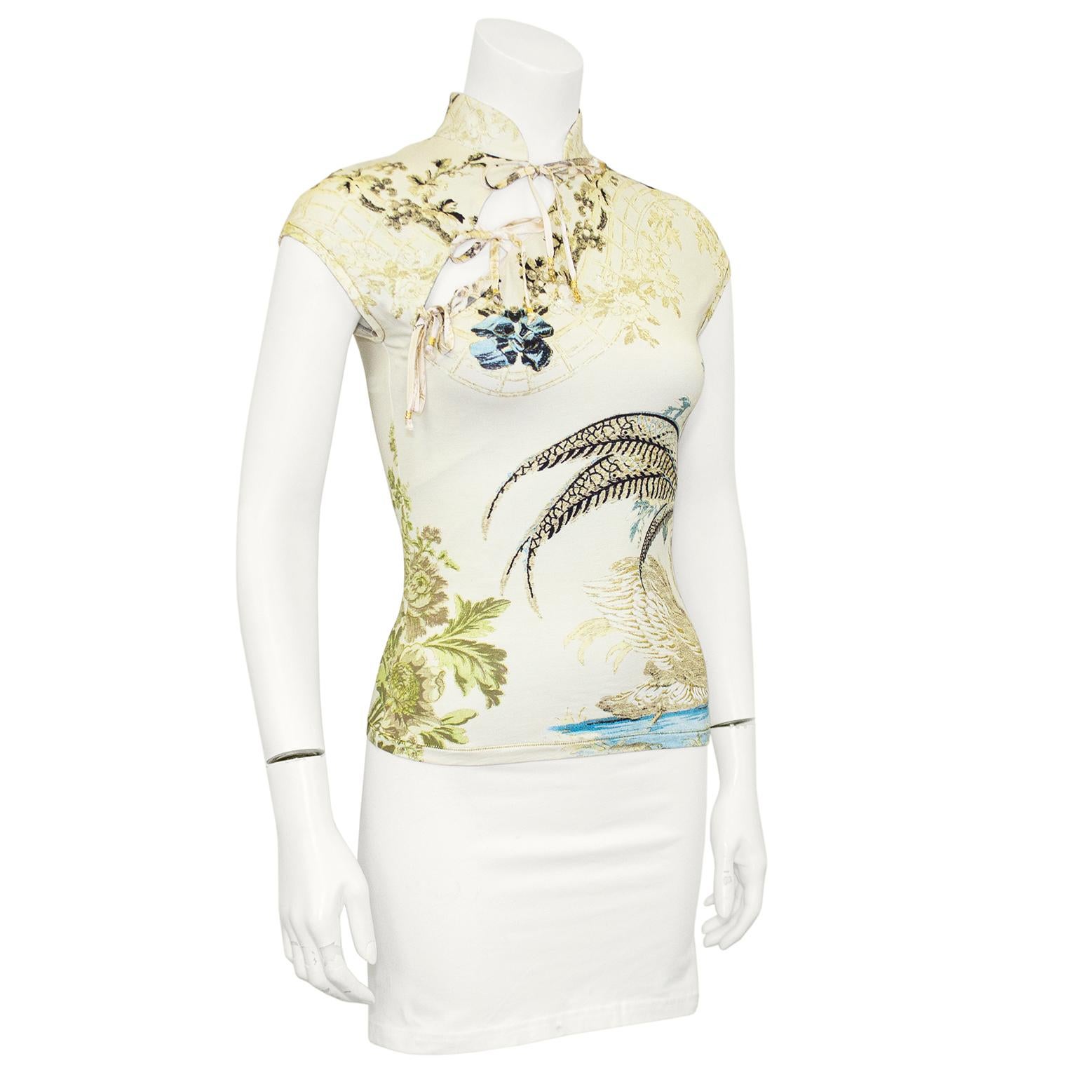 Roberto Cavalli mesh jersey top from S/S 2003. Cheongsam style featuring a Mandarin collar with a diagonal slit that fastens with three ties. Cream with a beautiful Chinoiserie inspired print featuring florals, lattice a pheasant tail and a swan