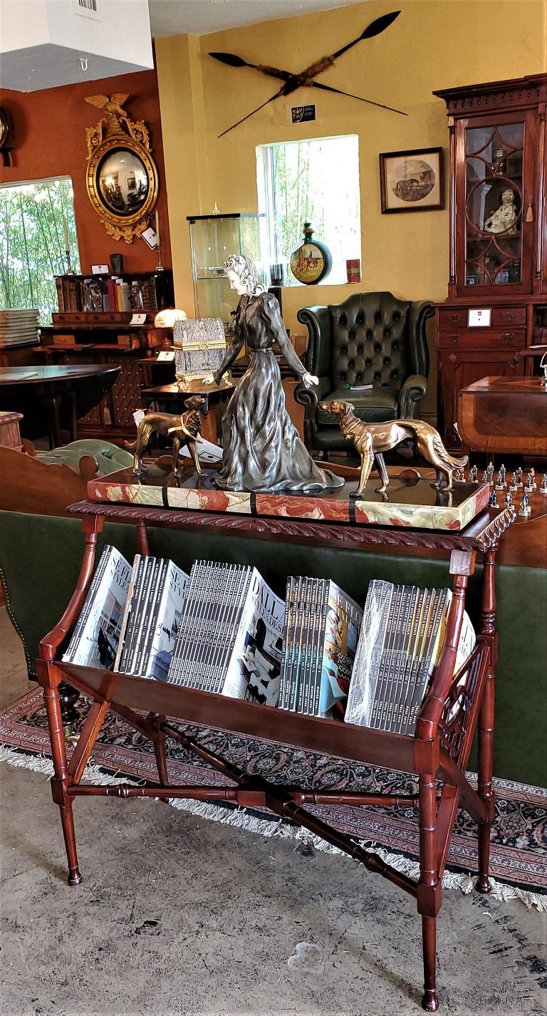 Presenting a fabulous and rare early 20th century American Nouveau magazine rack console.

I have never seen another quite like this.

Made of mahogany with lovely natural patina.

It is based upon the earlier concept of a ‘Canterbury’ from