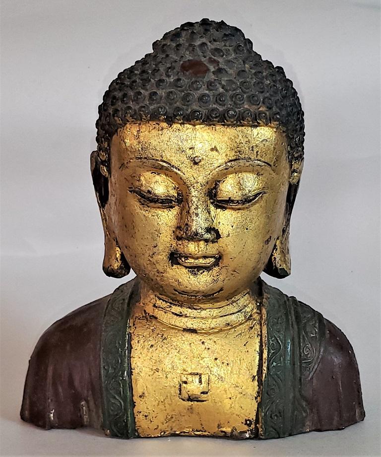 Archaistic Early 20th Century Cambodian Gilt and Painted Iron Buddha Bust