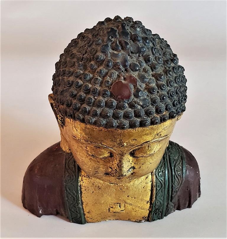 Early 20th Century Cambodian Gilt and Painted Iron Buddha Bust In Good Condition In Dallas, TX