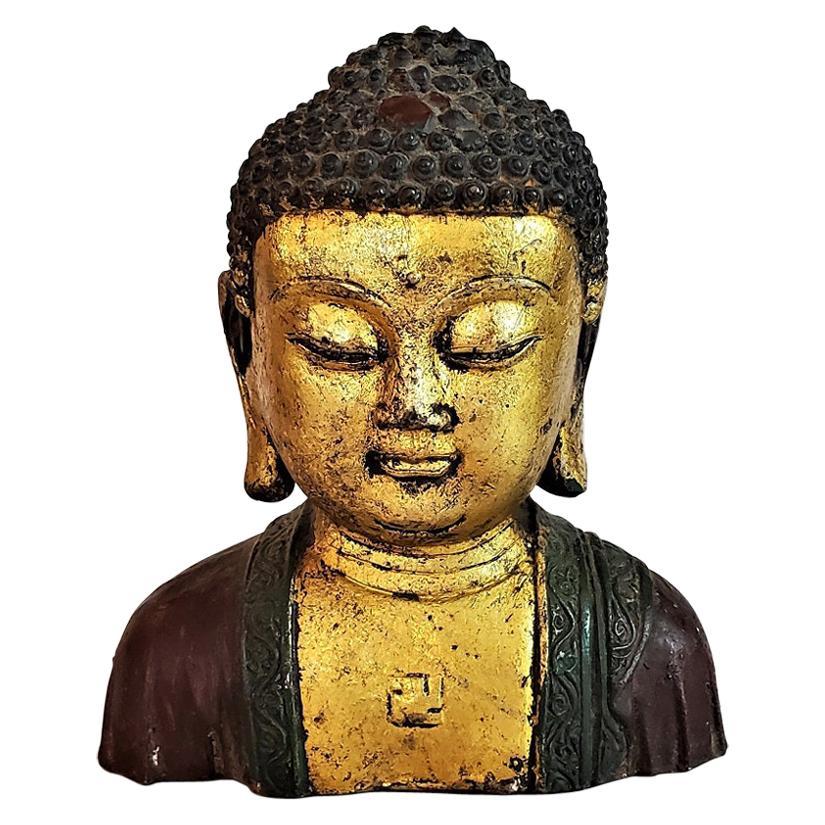 Early 20th Century Cambodian Gilt and Painted Iron Buddha Bust