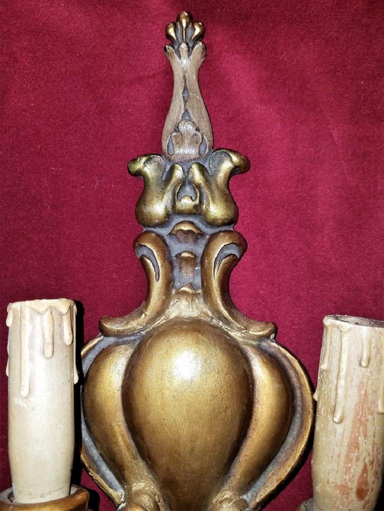 Presenting a gorgeous early 20th century carved and gilded wall light sconce by Thorvald Strom.

Hand carved by Thorvald Strom.

Thorvald Strom was a Danish artist, sculptor and furniture maker originally from Denmark but who emigrated to