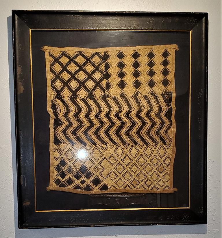 Presenting a gorgeous piece of West African Tribal Art, namely an early 20th century Congolese kuba framed textile.

Made in the Congo by the Kuba People (who are famous for their beautiful textiles), circa 1920.

The frame is more modern and