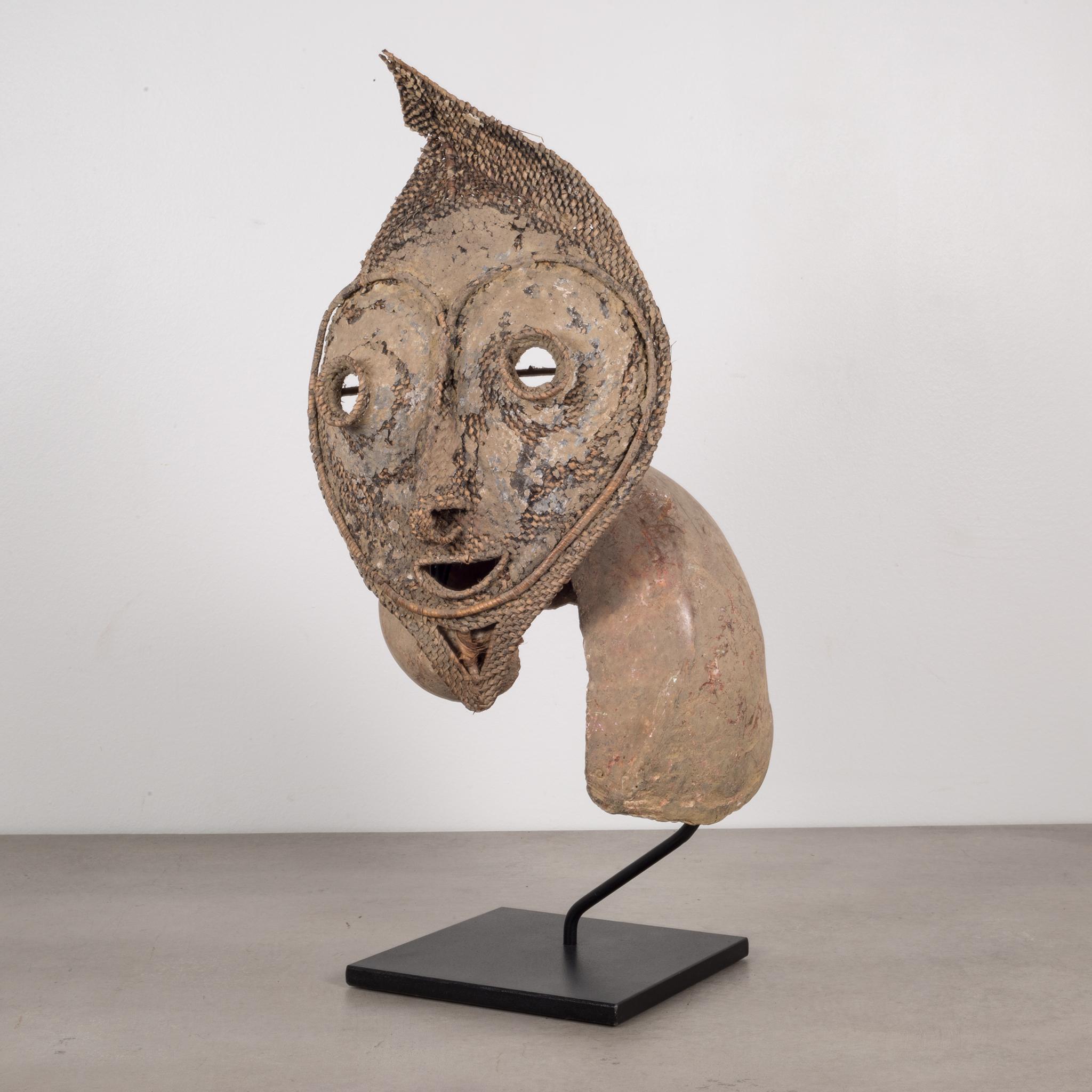 About

An Oceania, Papua, New Guinea, East Sepik, Boiken People Talipun mask mounted on a custom steel stand. A ‘talipun’ consists of a large piece of the sea snail attached to a woven ancestral face.

 Creator: Boiken People, Papua New