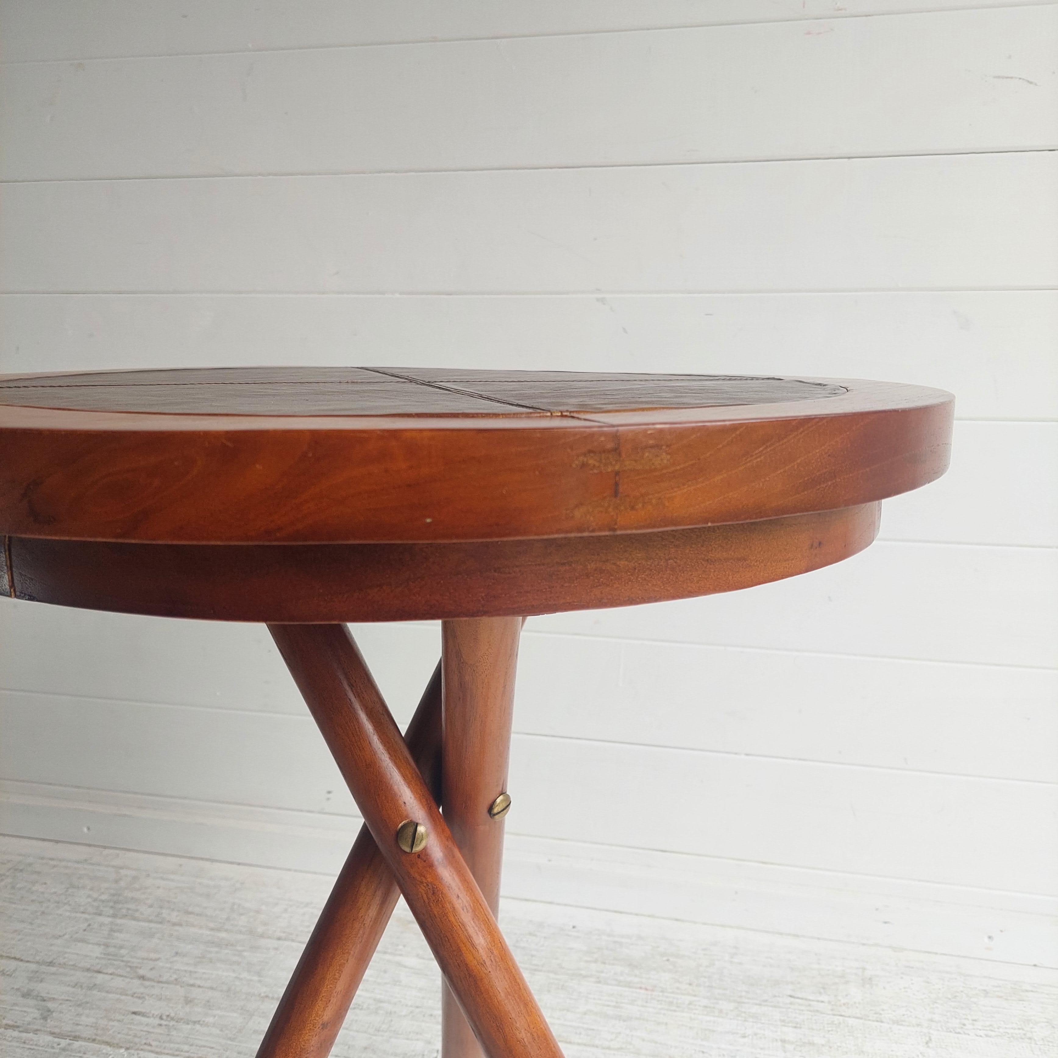 Early 20th Century /Midcentury round Campaign  handmade side table
A lovely late early 20th century, very understated, side table

Teak  Table similar to the style of Nils Trautner for ARY Nybro, Sweden, 1960s

The Campaign Teak and Leather style