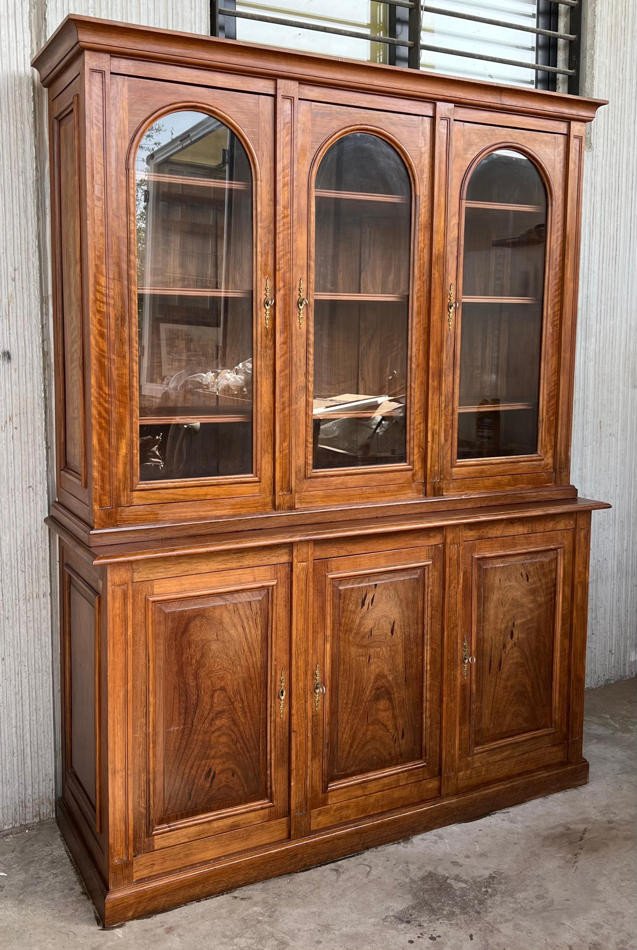 arched bookcase with glass doors