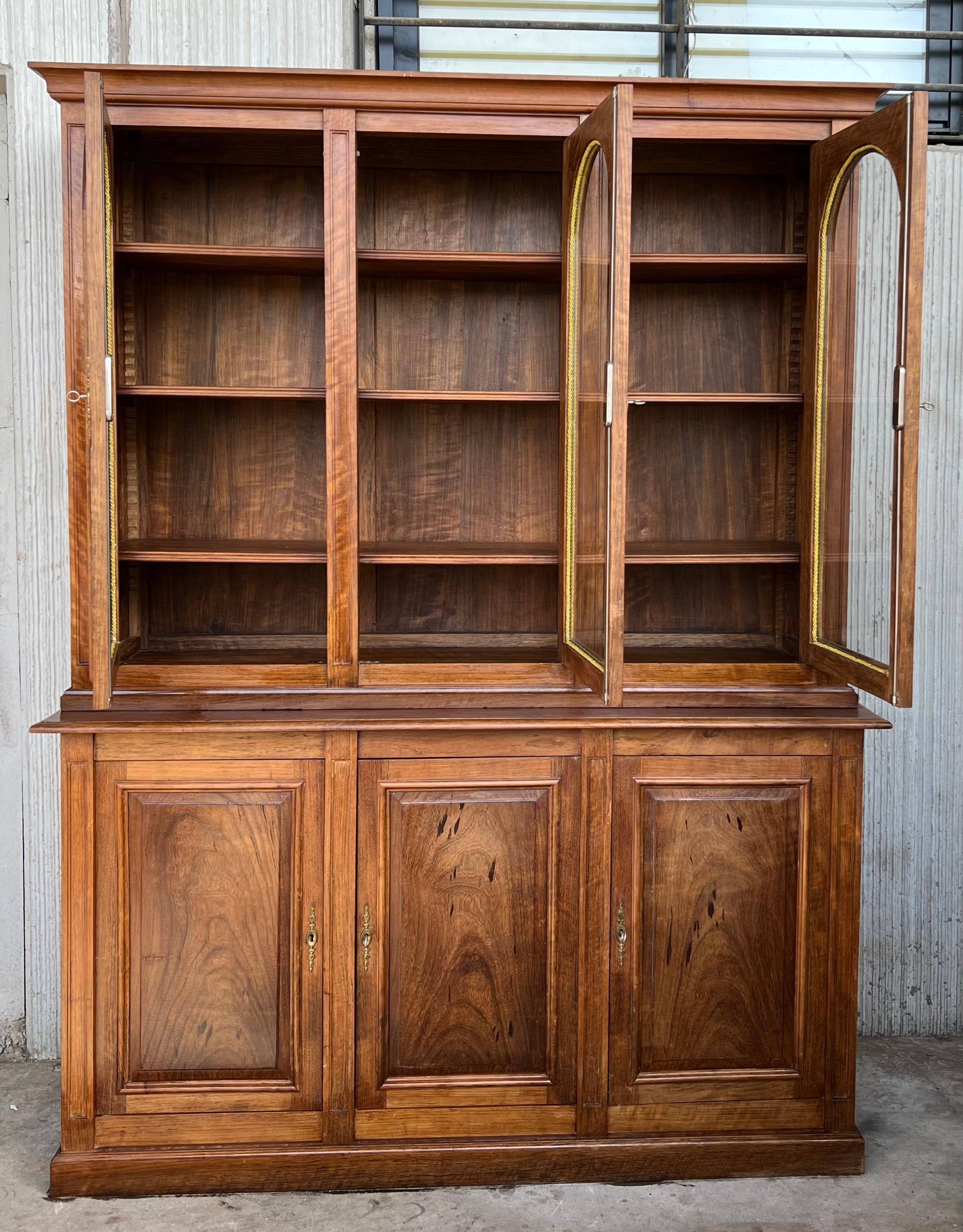arched bookcase with glass doors