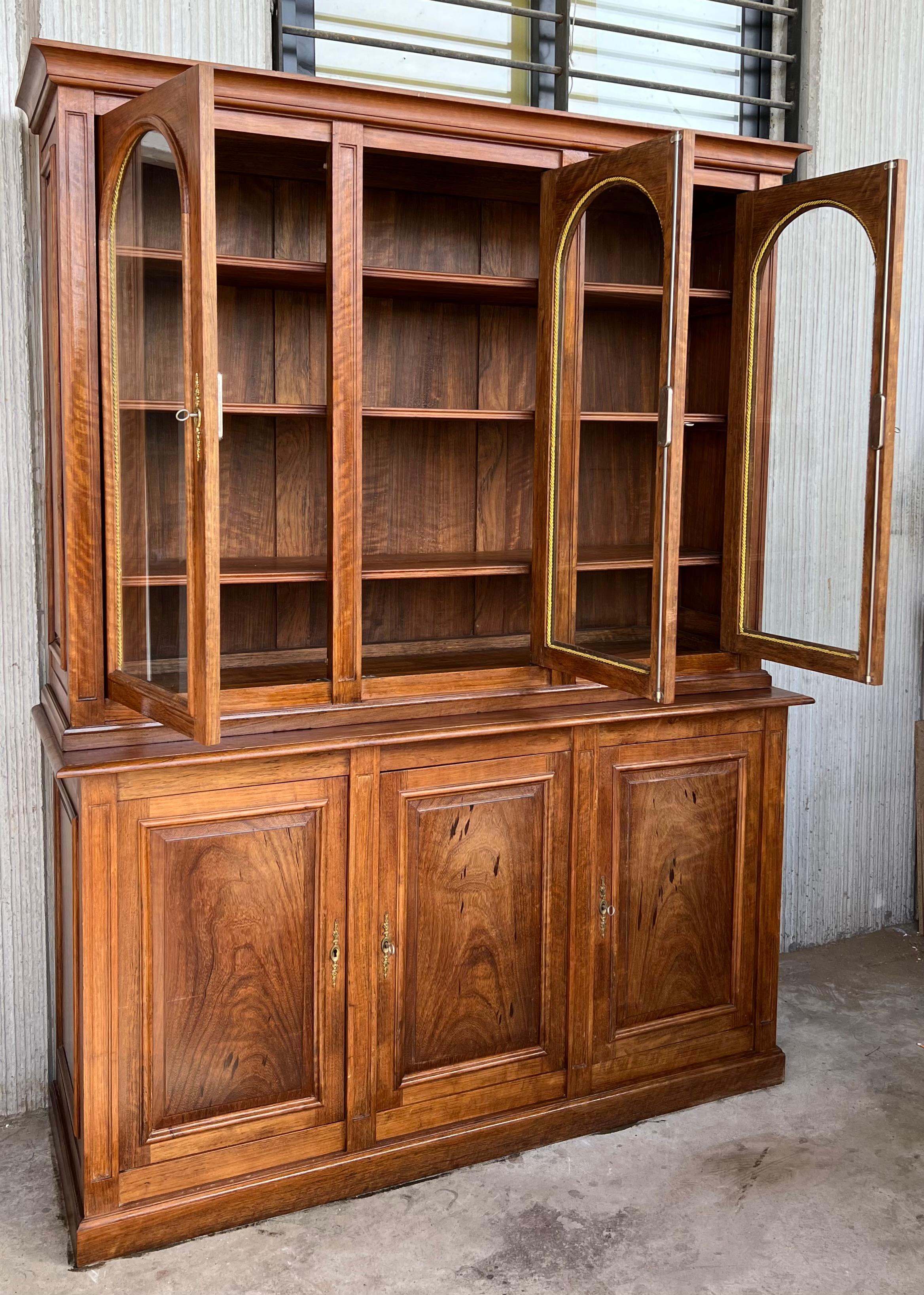 arched glass bookcase