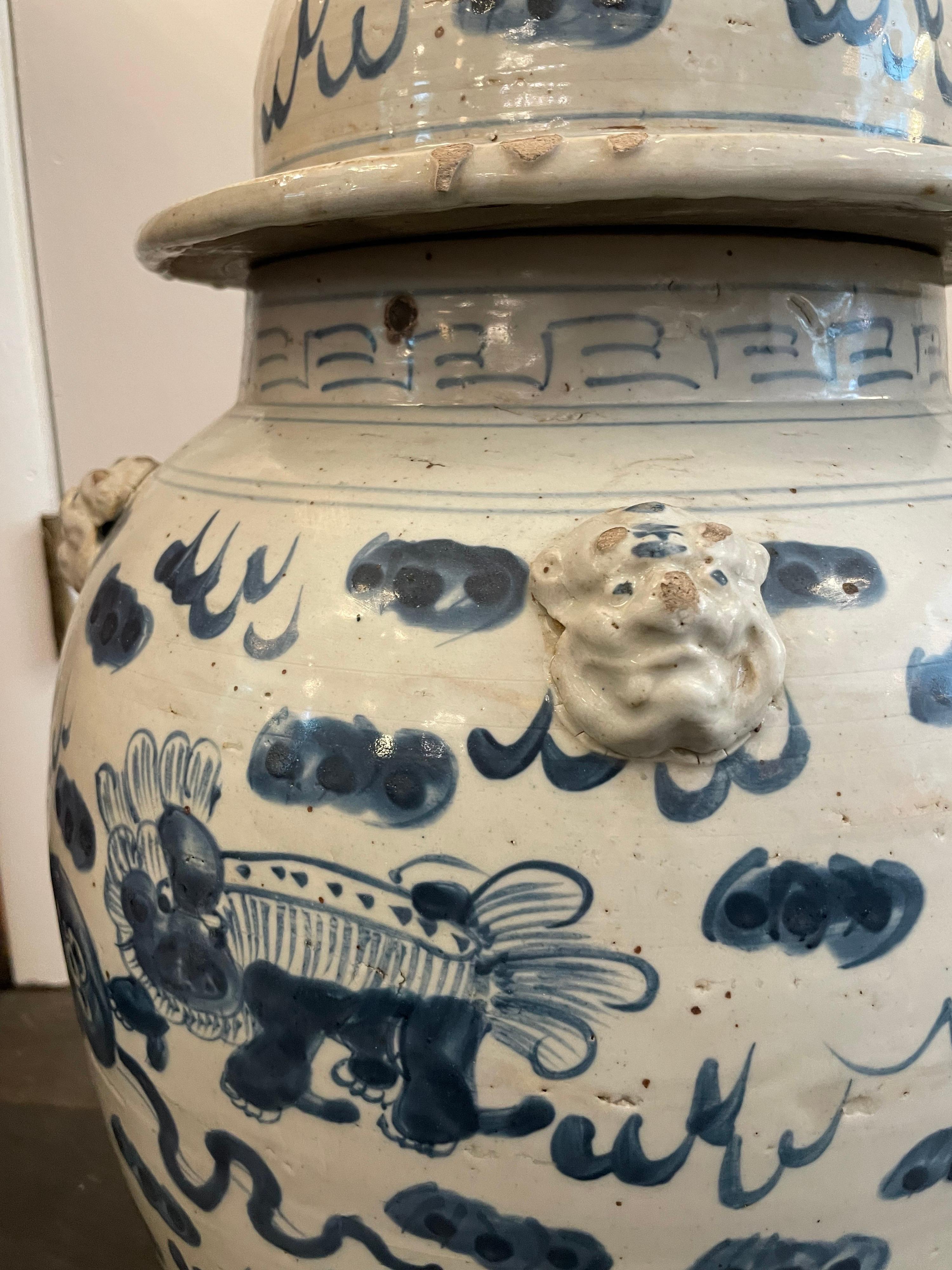 A blue and white lidded temple jar. Depicting ancient dragons. It has Fu-dog Maks handles all around. Then on the Lid has a handle in the form of a fu-dog finial.
Very high quality piece. Part of the chinoiserie made for the European market among