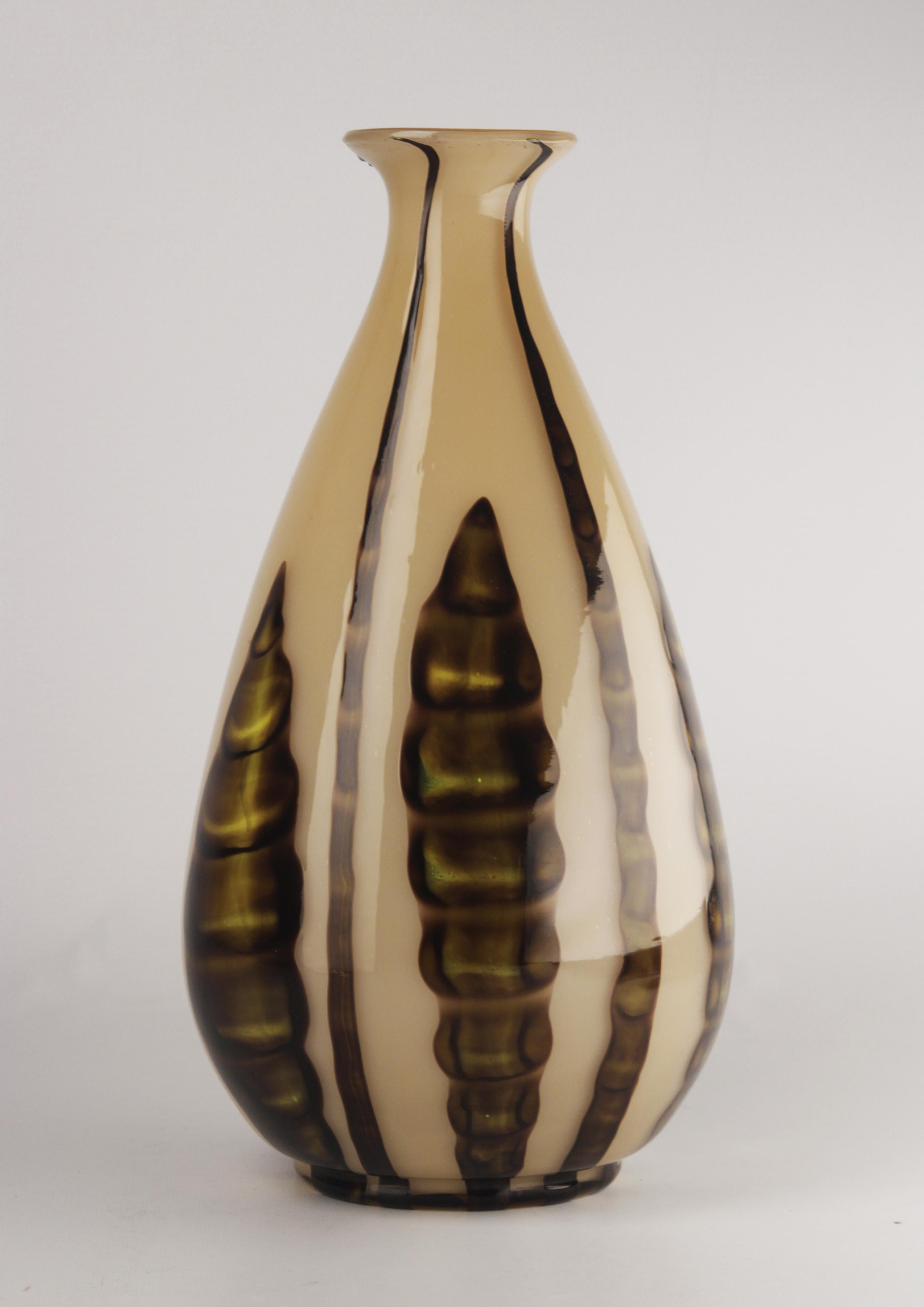 Early 20th century Art Déco czech glazed art glass bulbous vase decorated with plant motifs

By: unknown
Material: glass, art glass
Technique: glazed, cast
Dimensions: 8 in x 13 in
Date: early 20th century
Style: Art Déco
Place of origin: Czech