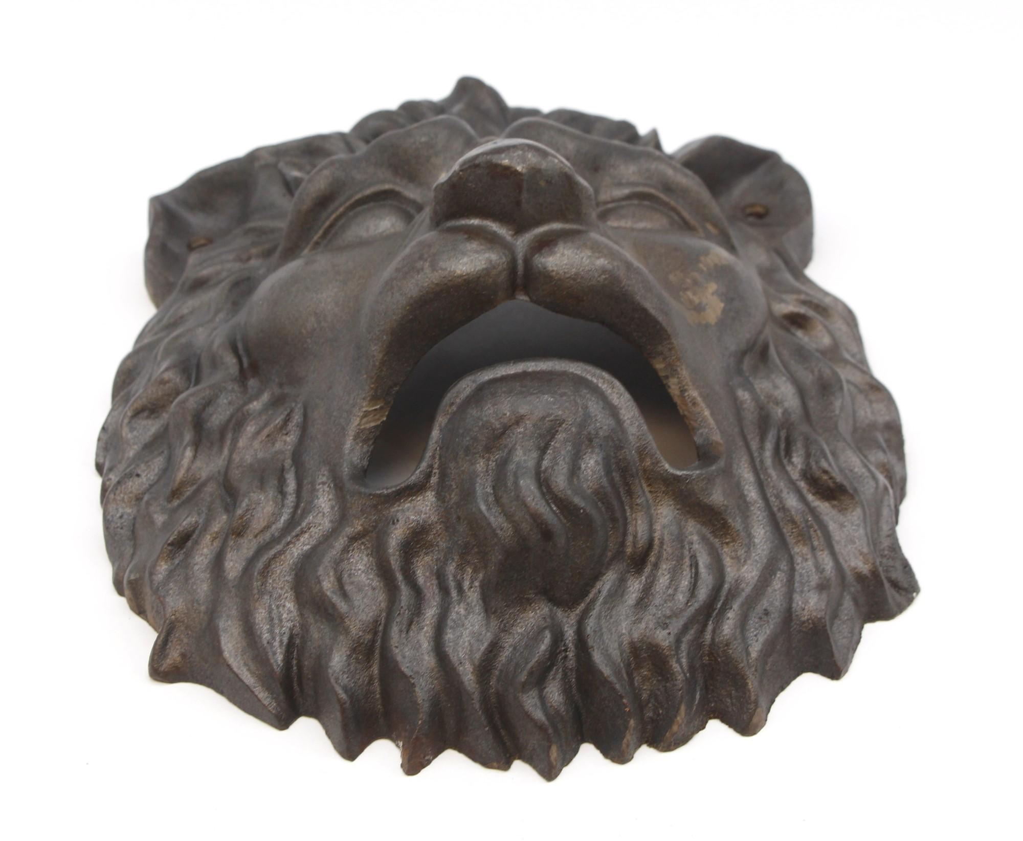 Early 20th century detailed lion head with an open roaring mouth. Antique cast iron. Please note, this item is located in one of our NYC locations.