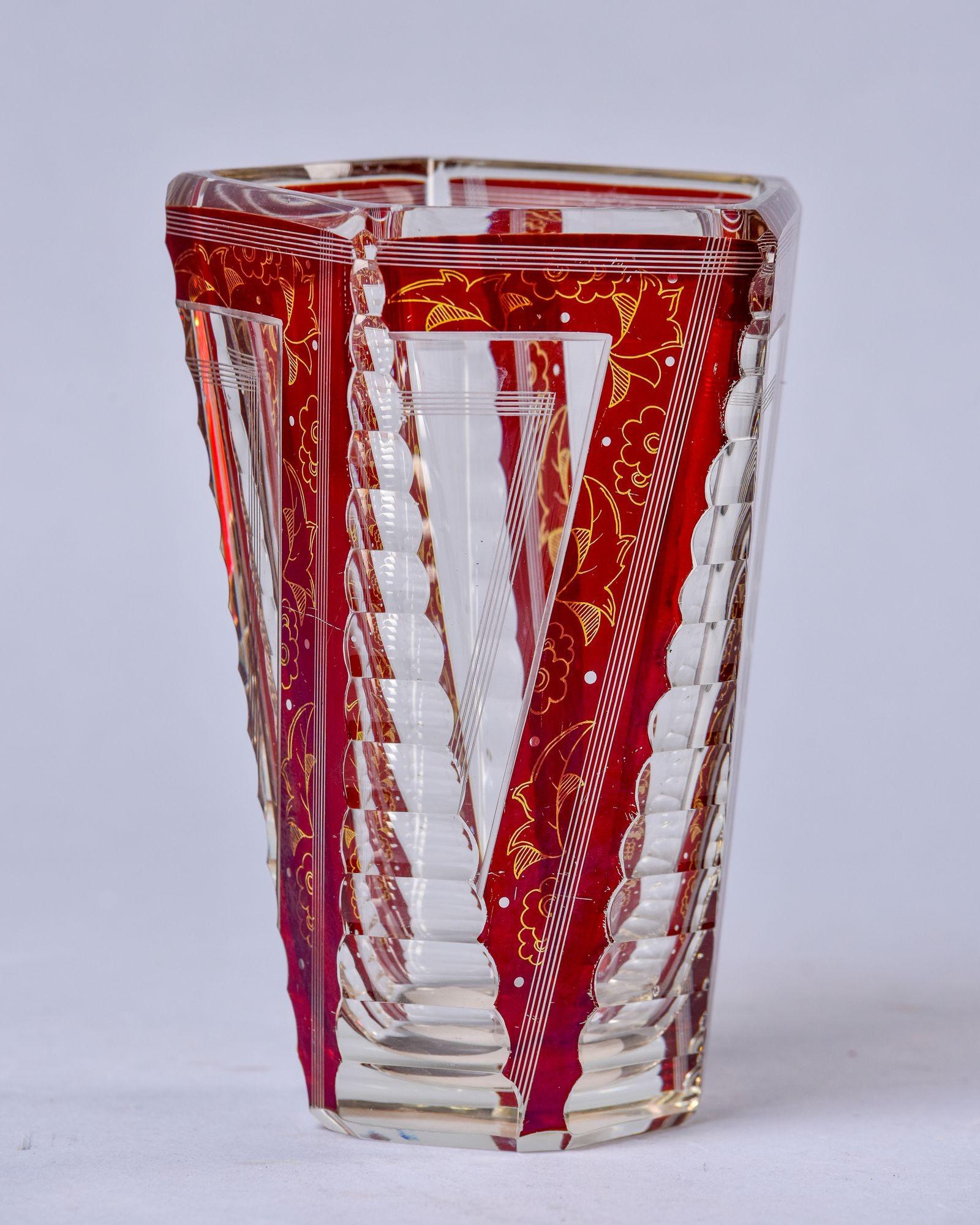 Circa 1930s Bohemian glass vase in tapered five panel shape with cut to red detailed design at panel borders. Unknown maker.