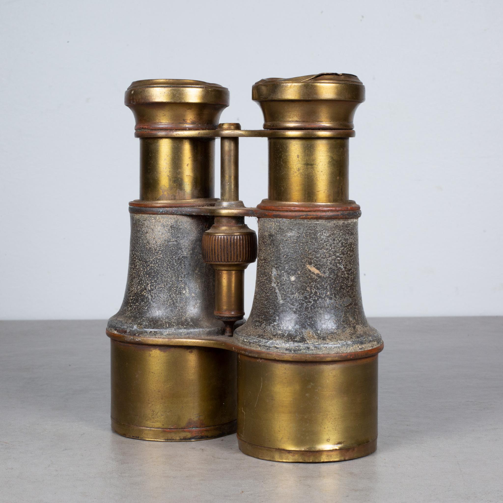 ABOUT

An original pair of brass field binoculars wrapped in leather. The objective lenses are clear and their optics are good. The metal focus wheel works well. The piece is in good condition with appropriate patina for its age. 

 CREATOR