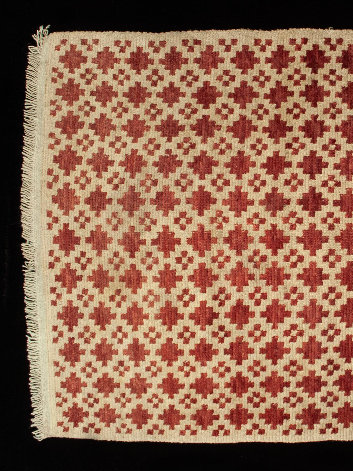 Alfombra ceremonial de polígonos escalonados y cruces, ladrillo/crema, Tíbet, principios del siglo XX Tibetano en venta
