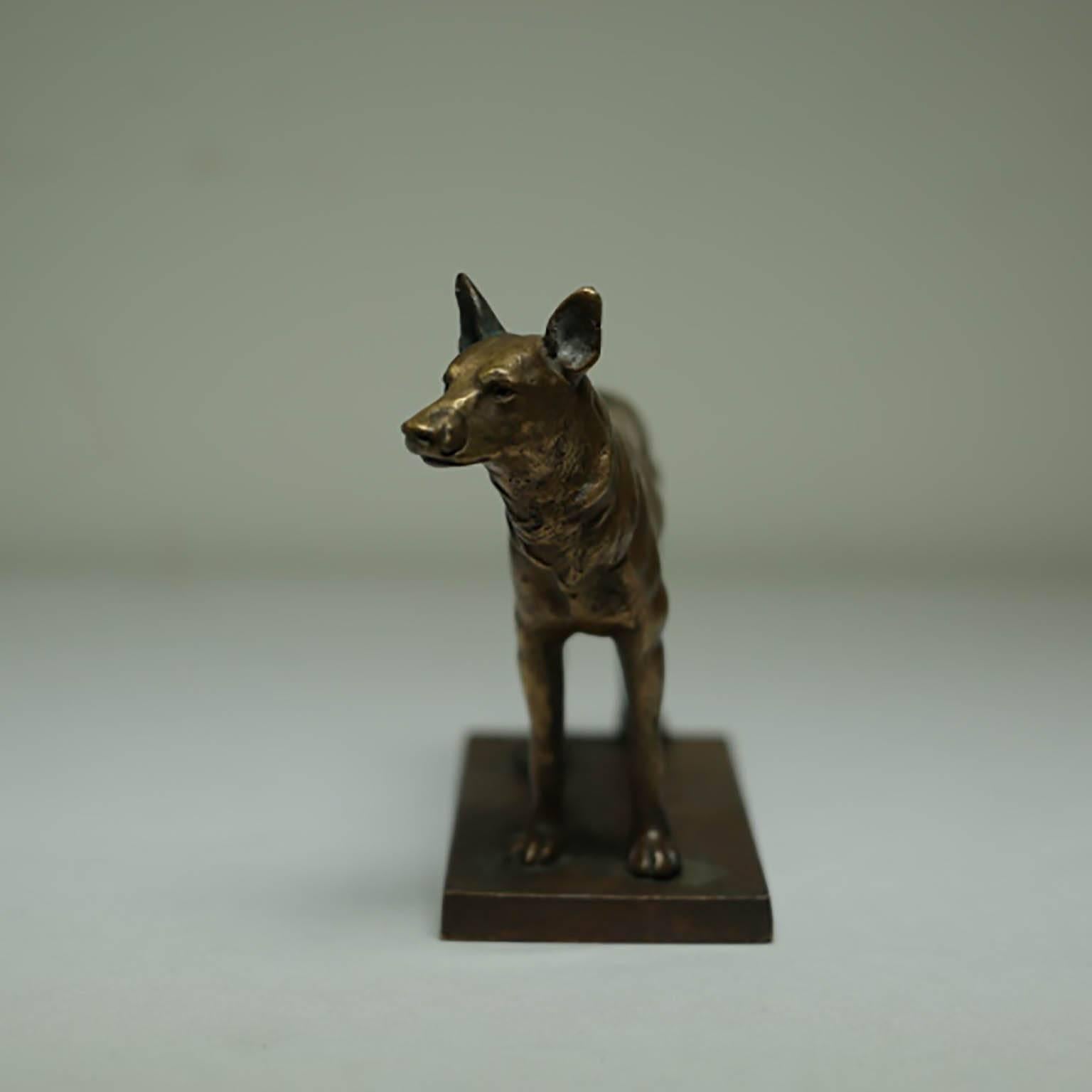 Small bronze dog statue stamped 