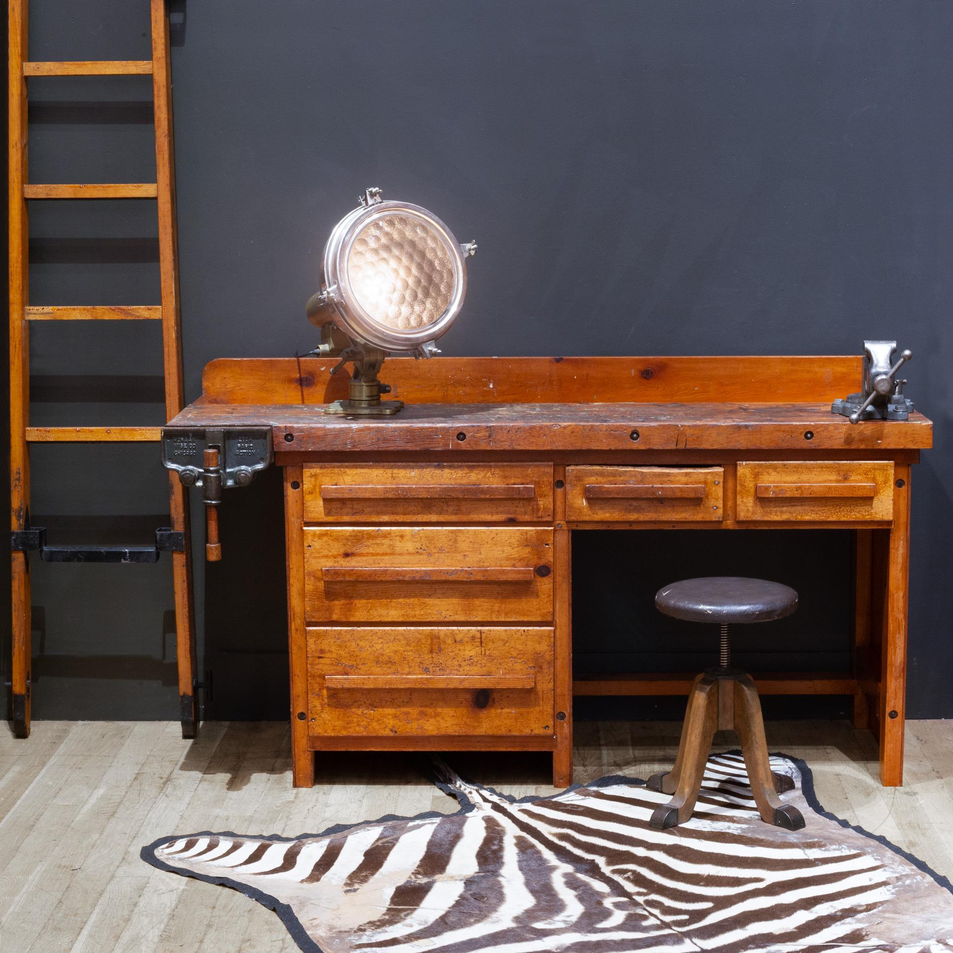 ABOUT

Perfect to use as a bar or console. A beautifully worn and well used, solid Maple carpenter's workbench with five drawers and two vices. Each drawer has ample storage. The vice in front is original to the piece. The top vice has been added