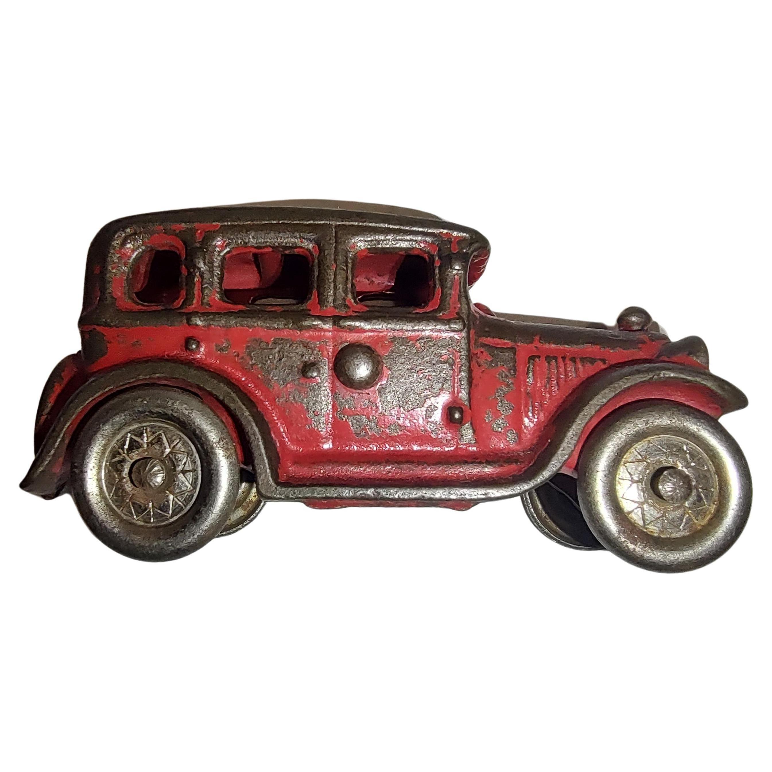 Industriel Sedan rouge d'origine en fonte du début du 20e siècle par A C Williams avec roues en nickel en vente