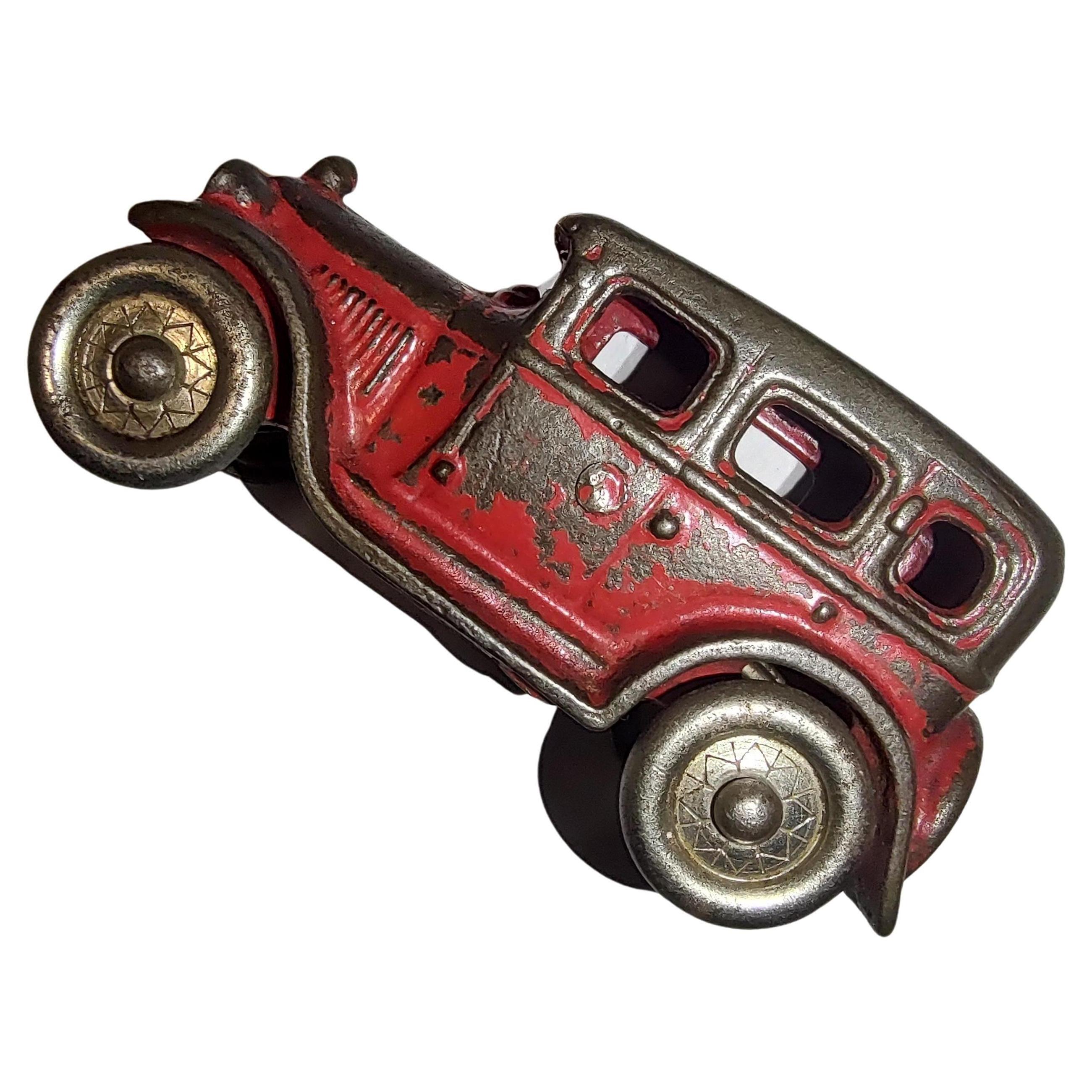 Fabulous and classic cast iron toy from the early thirties. In what looks like to the original Red with Nickel Wheels and the right amount of wear to the paint. Made by the A. C. Williams Company.