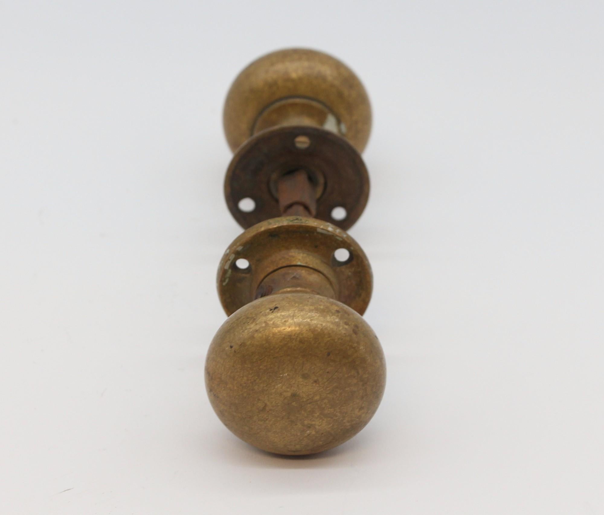 American Classical Early 20th C Classic Cast Brass Round Door Knobs with Rosettes