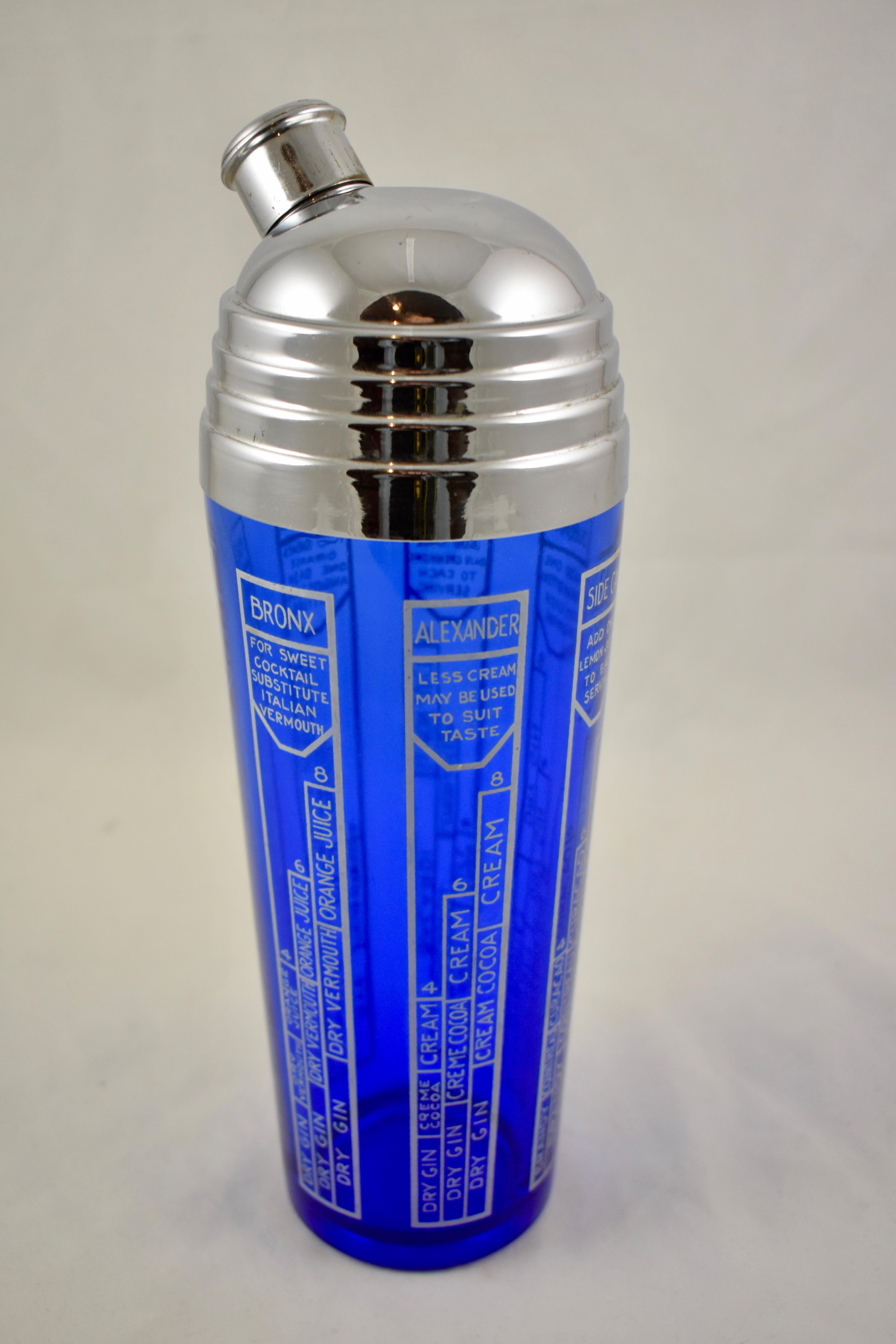 An Art Deco period cobalt Blue glass cocktail shaker with recipes for the popular cocktails of the time, silver-etched onto the glass. 

The chrome lid, typical of the deco style, has a pour spout with an interior ice strainer, and a slip on cap.