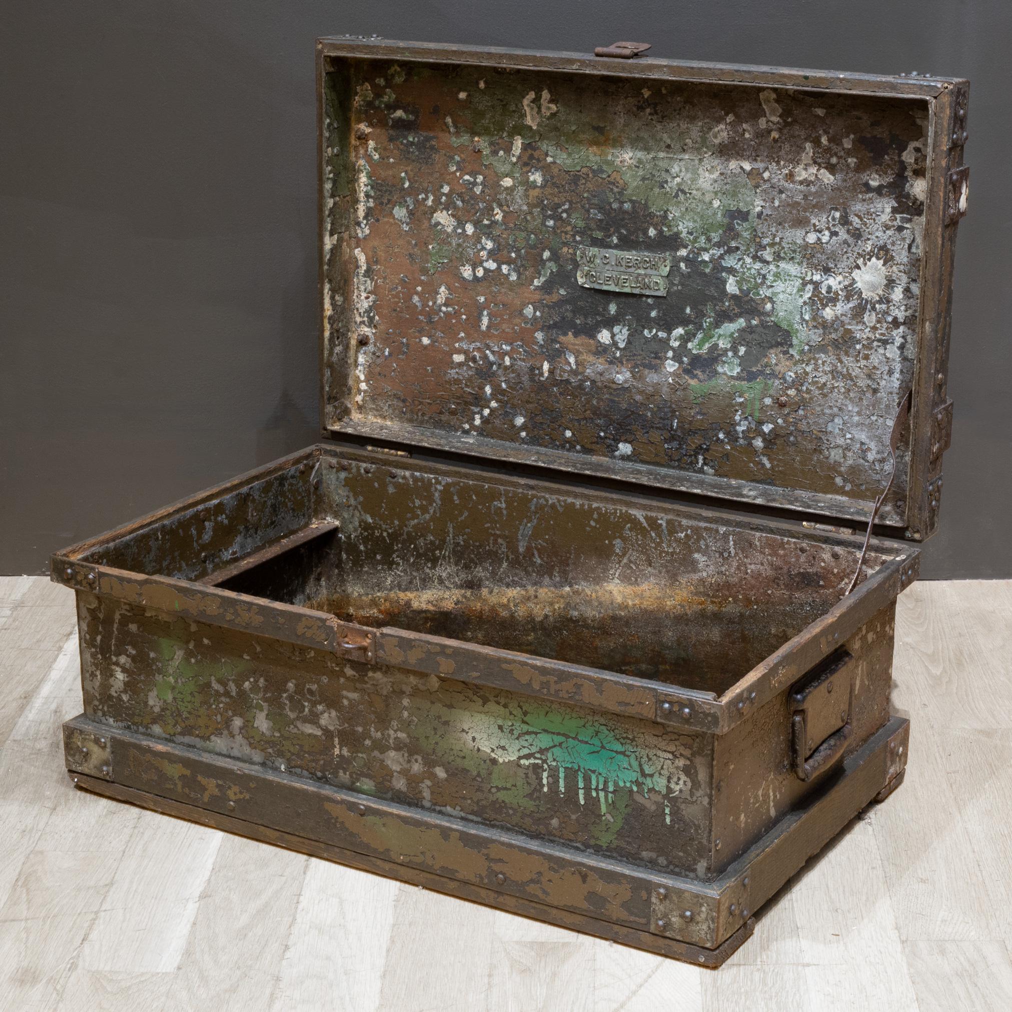 ABOUT

An antique distressed metal chest with cast iron handles and wooden straps. Original metal label inside.

    CREATOR W.C. Kerch, Cleveland.
    DATE OF MANUFACTURE c.1930-1940.
    MATERIALS AND TECHNIQUES Wood, Cast Iron, Metal.
   