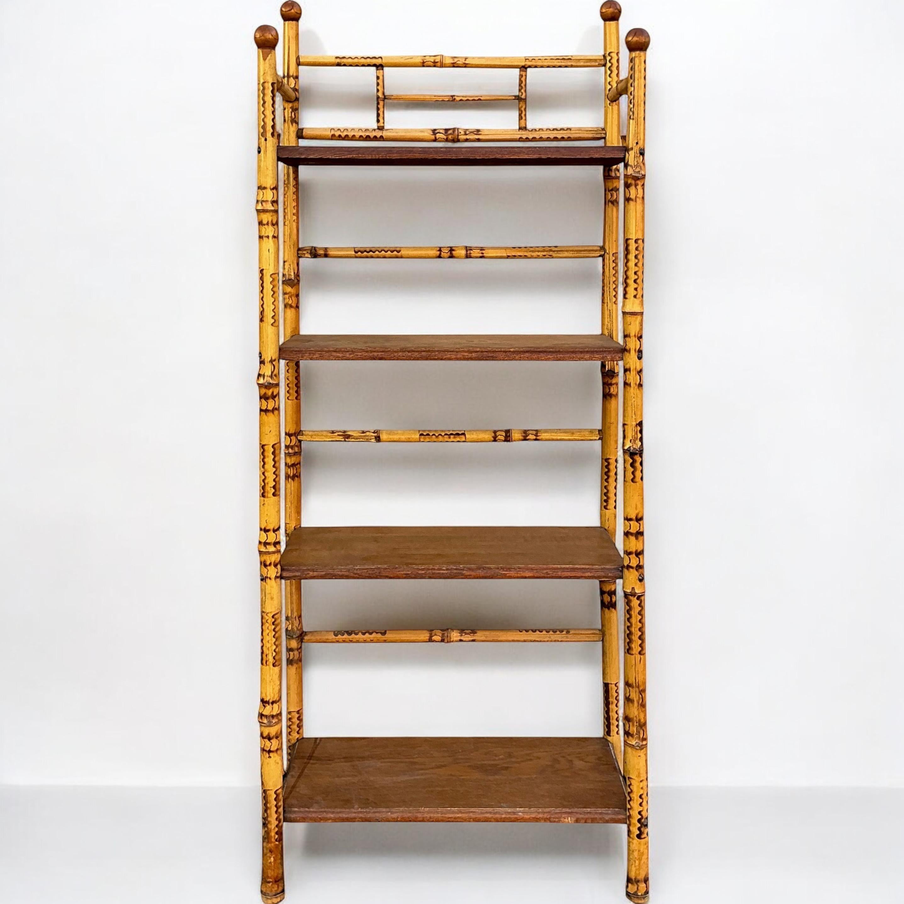 This is an early 20th century English bamboo shelf or etagere in very good condition. The shelves are oak. Shelf heights 38”, 28”, and 17”. 

Normally shipping can run two to five weeks, but this could work with FedEx Freight.