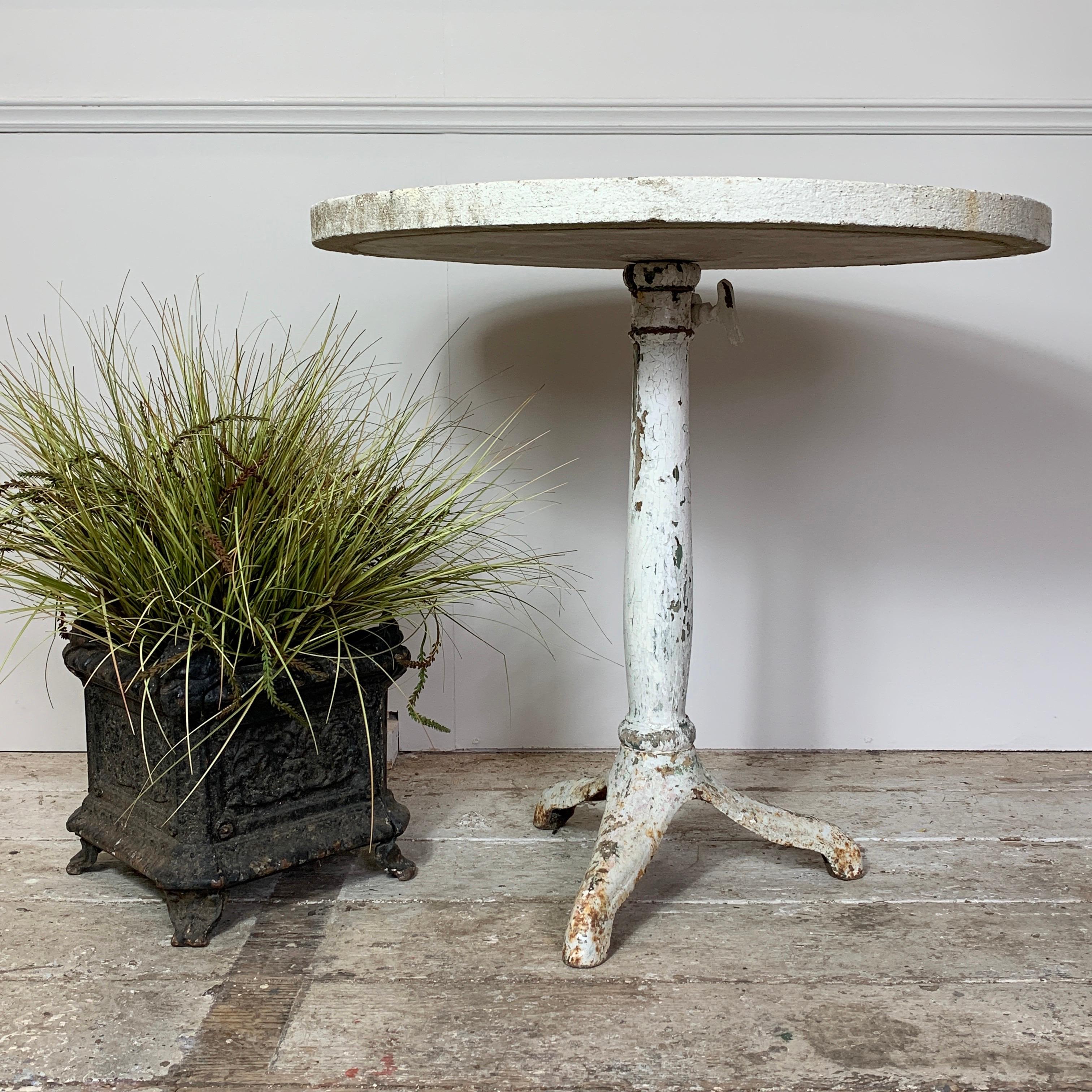 Early 20th Century, Estate Made French Garden Table. Cast Iron Foot, Wooden Pedestal And Composite Stone Table Top. The Top Can Be Removed From The Pedestal And Is Held In Place With The Large Metal Twist Key Underneath. 70Cm Height, 72Cm Width,
