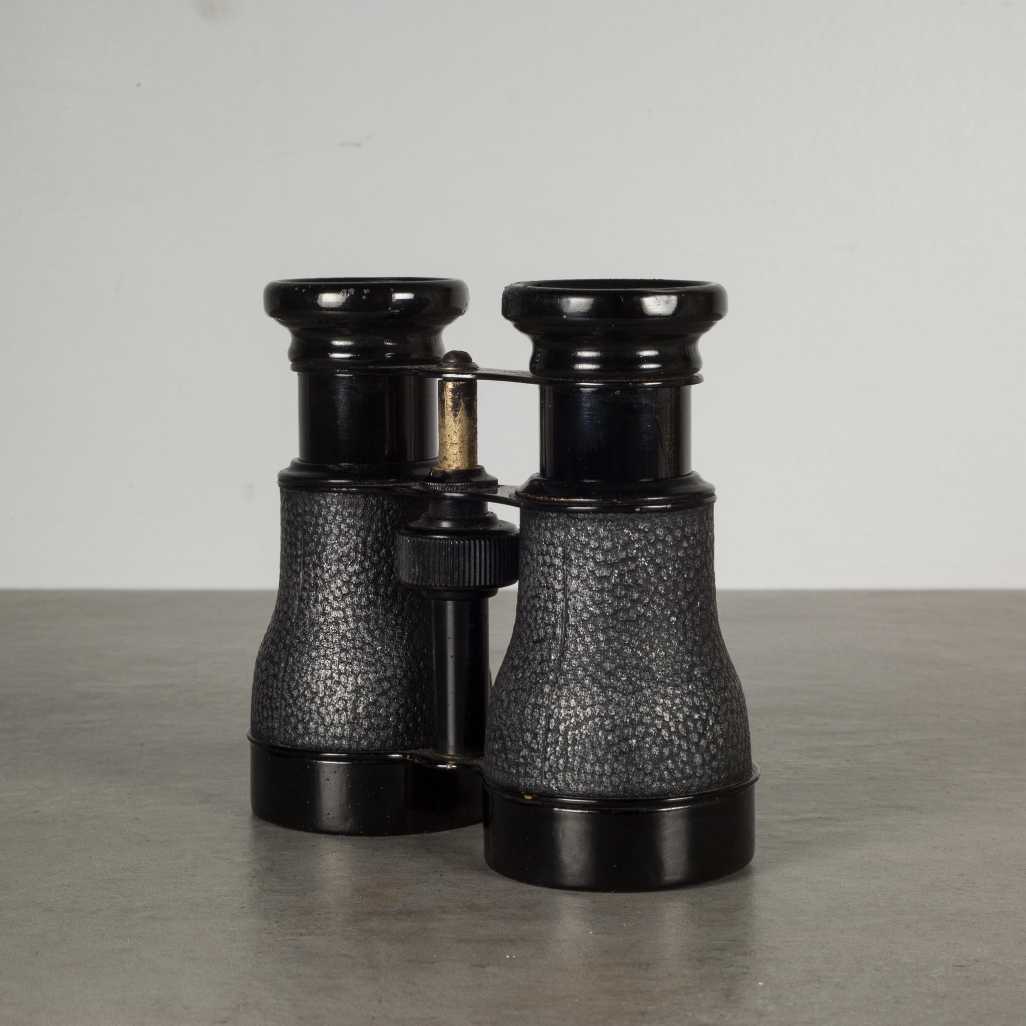 ABOUT

An original pair of faux Ostrich and enameled brass field binoculars. The objective lenses are clear and their optics are good. The metal focus wheel works but is very tight. The piece is in good condition with appropriate patina for its