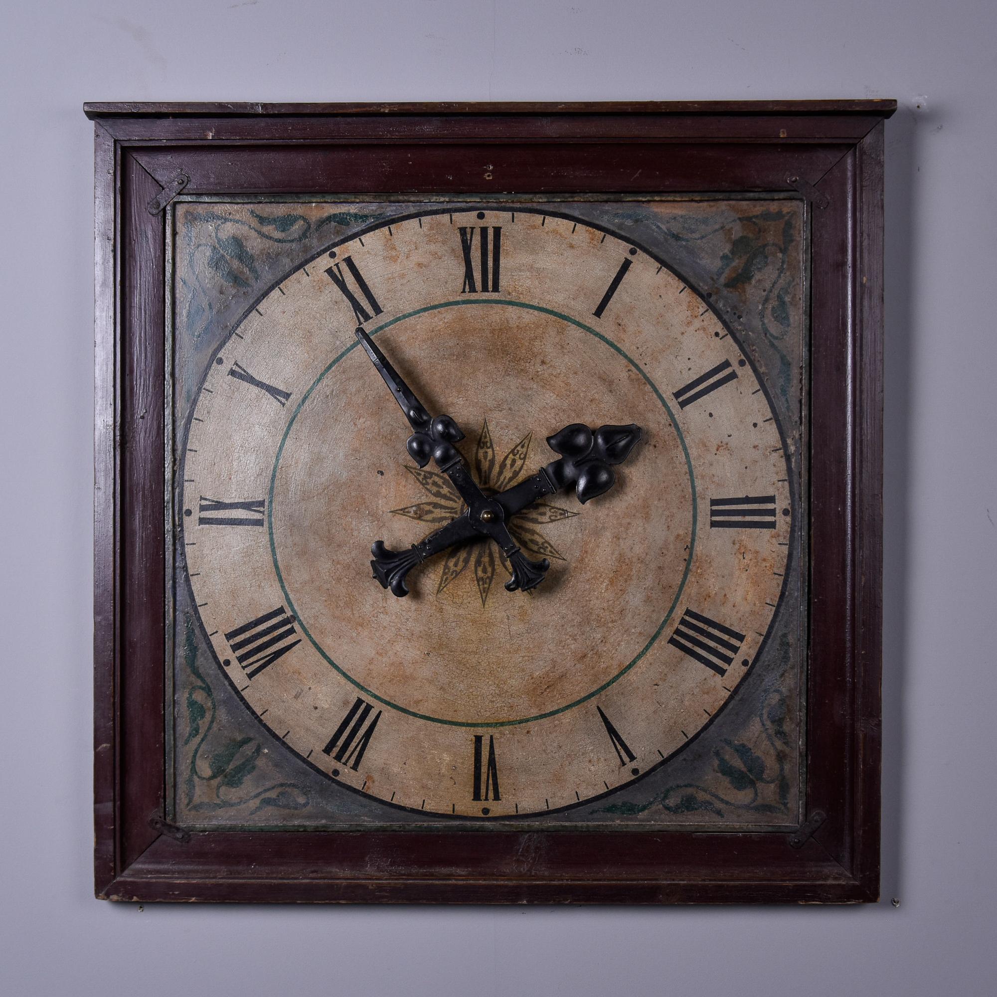 Found in France, this painted metal clock face plate has been mounted with a dark wood frame and dates from the early 20th century. These genuinely old clock faces are getting harder to find. Unknown maker.